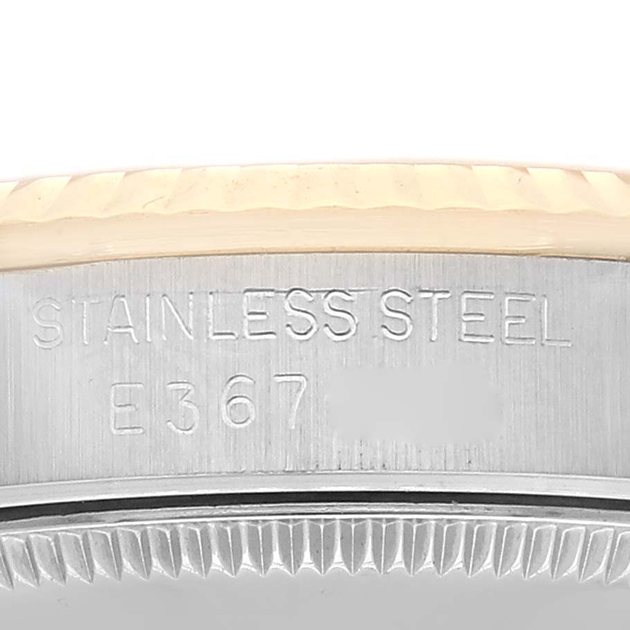 This close-up image shows the side engraving on the stainless steel case of a Mid-Size Rolex watch.