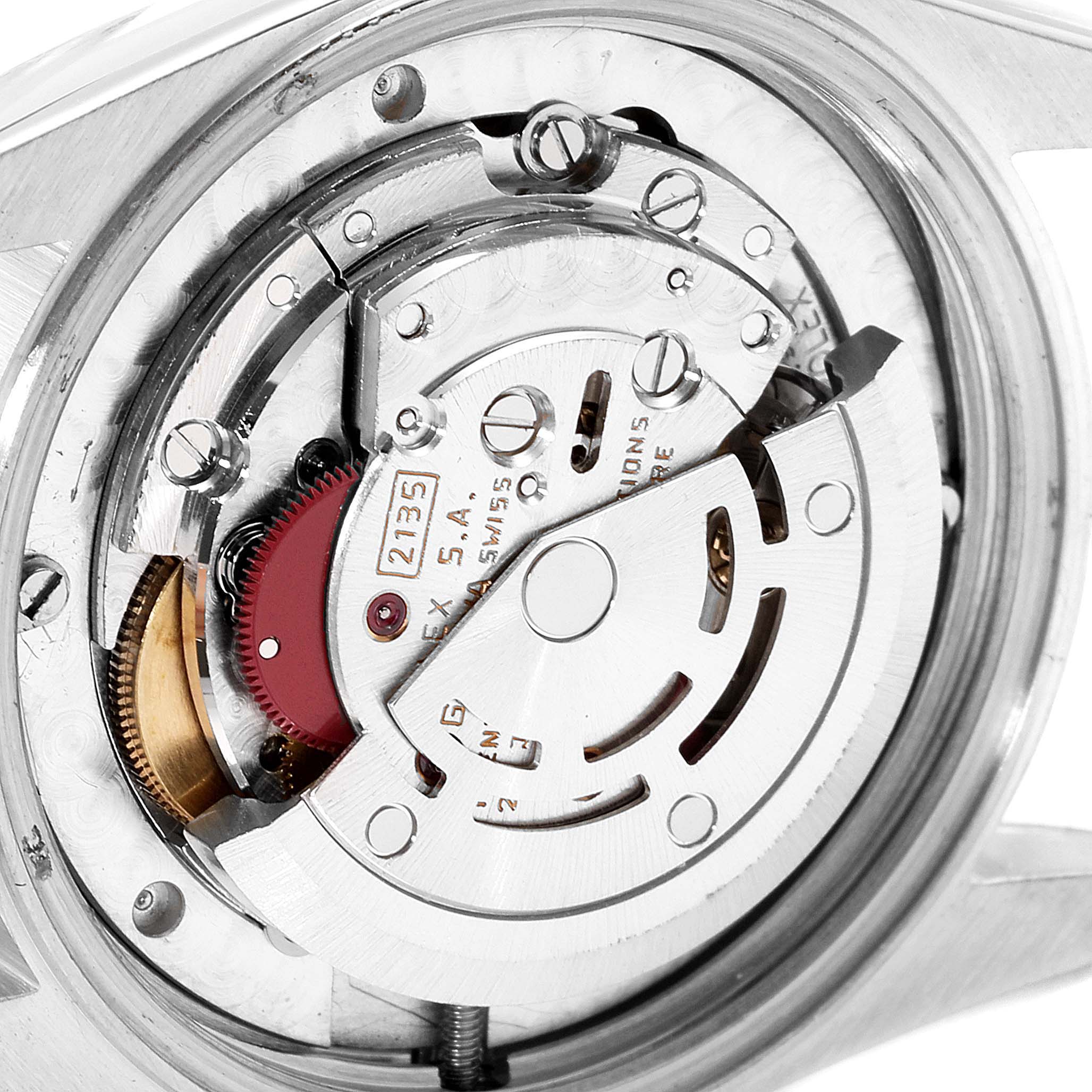 This image shows the detailed internal mechanism of a Rolex Mid-Size 68273 Women's Steel and Gold (two tone) Champagne Dial 68273 Women's Steel and Gold (two tone) Champagne Dial model watch from a close-up angle, revealing its intricate parts.