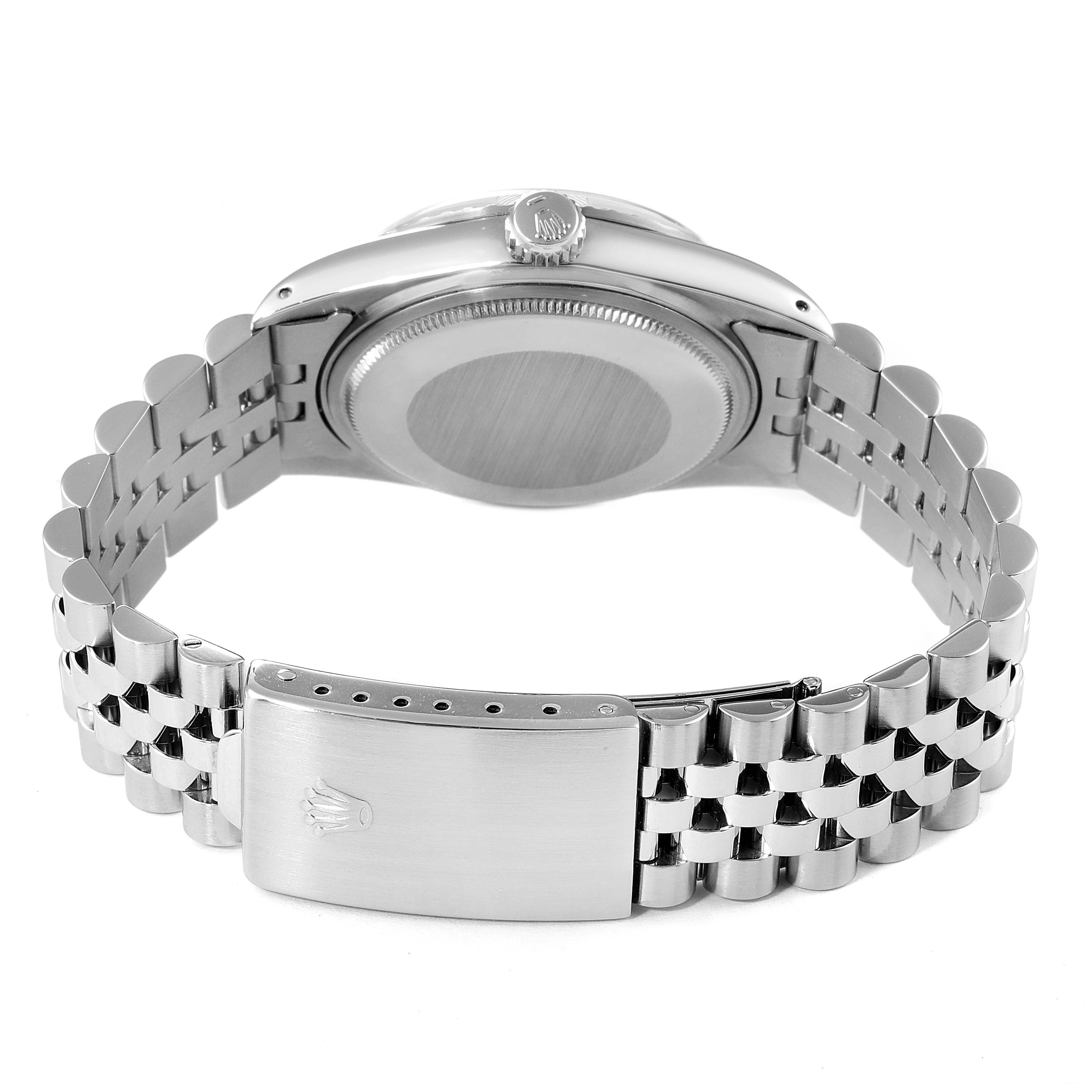 The image shows the back side of the Rolex Vintage Collection 16030 Men's Stainless Steel Silver Dial 16030 Men's Stainless Steel Silver Dial watch, including its case, crown, and metal bracelet with clasp.