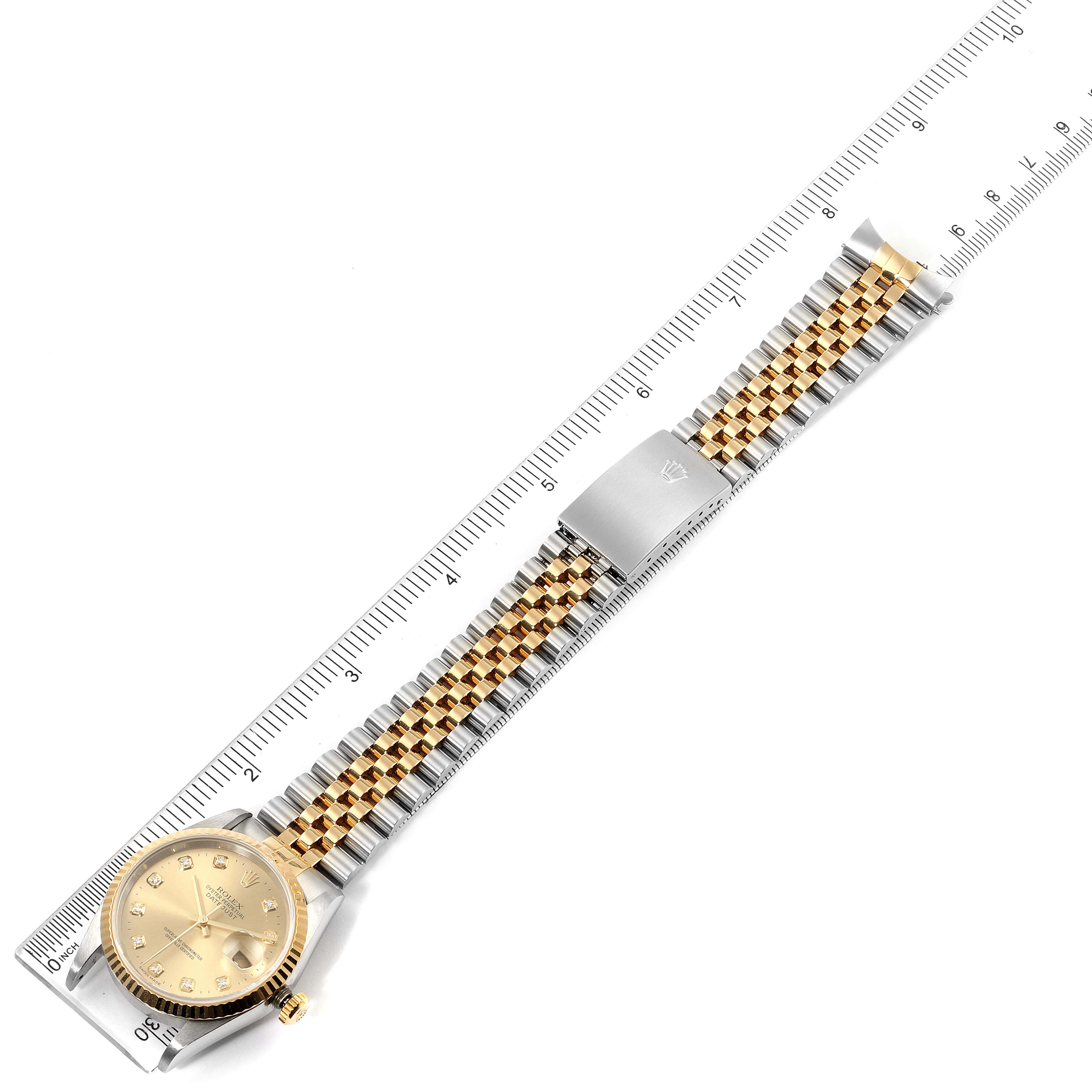 The image shows a top-down view of the Rolex Datejust 16233 Men's Steel and Gold (two tone) Champagne Dial 16233 Men's Steel and Gold (two tone) Champagne Dial watch, highlighting the face, bracelet, and deployment clasp.