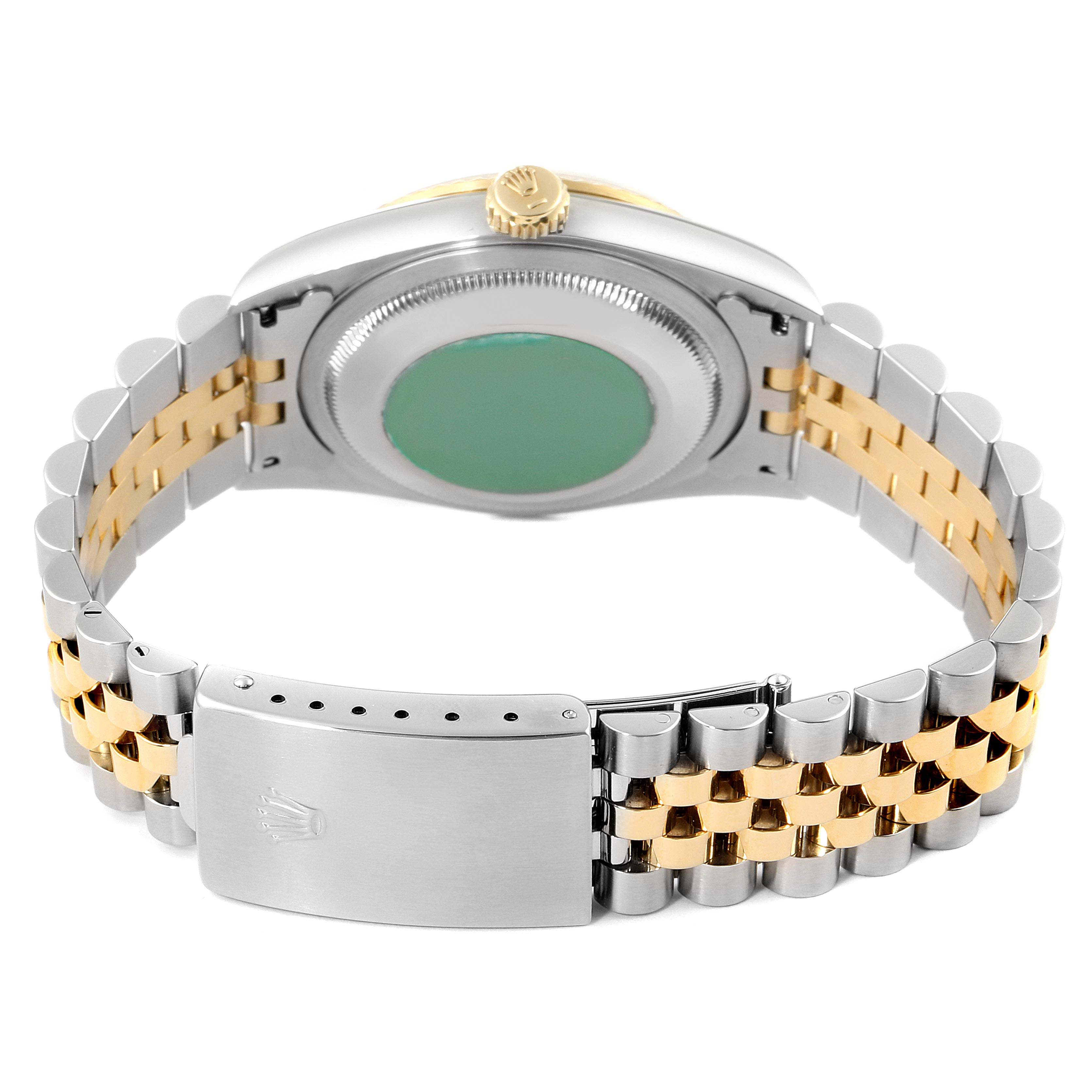 This image shows the back and bracelet clasp of a Rolex Datejust 16233 Men's Steel and Gold (two tone) Champagne Dial 16233 Men's Steel and Gold (two tone) Champagne Dial watch, highlighting the two-tone metal design.