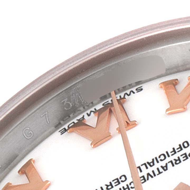 This image shows a close-up of the dial, hour markers, and bezel of the Rolex Datejust 179171 Women's Steel and Gold (two tone) White Dial 179171 Women's Steel and Gold (two tone) White Dial watch.