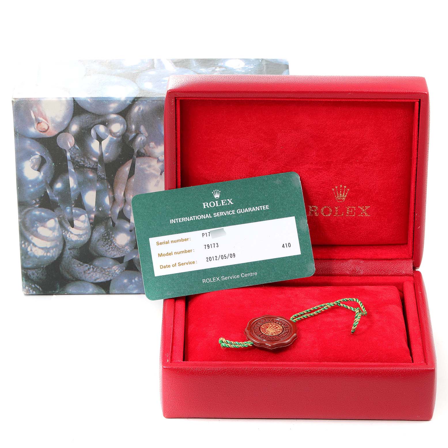 The image shows a Rolex Datejust 79173 Women's Steel and Gold (two tone) Champagne Dial 79173 Women's Steel and Gold (two tone) Champagne Dial watch box, service guarantee card, and a Rolex tag.