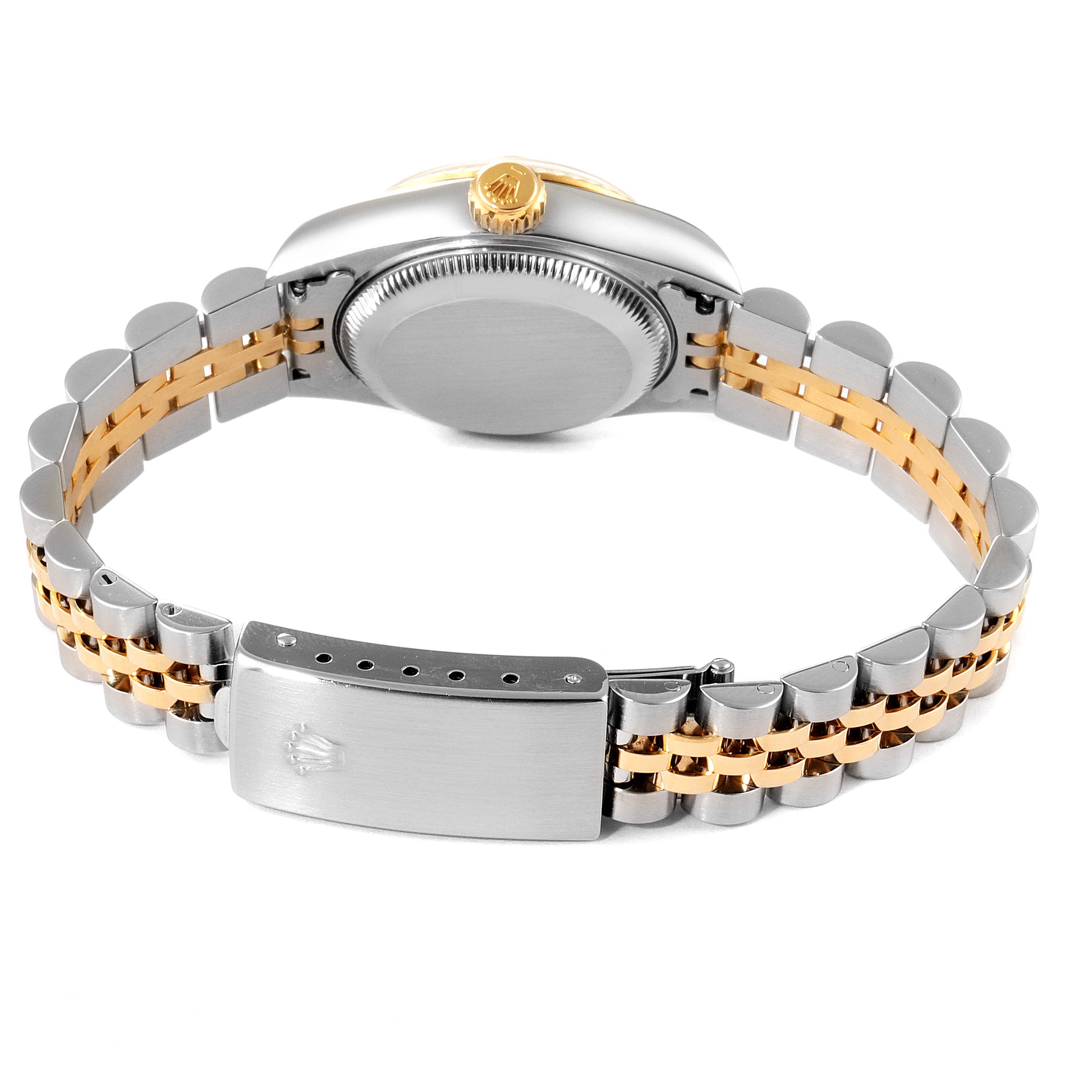 This image shows the back and side view of the Rolex Datejust 79173 Women's Steel and Gold (two tone) Mother of Pearl Dial 79173 Women's Steel and Gold (two tone) Mother of Pearl Dial watch, highlighting the case back, crown, and two-tone metal bracelet.