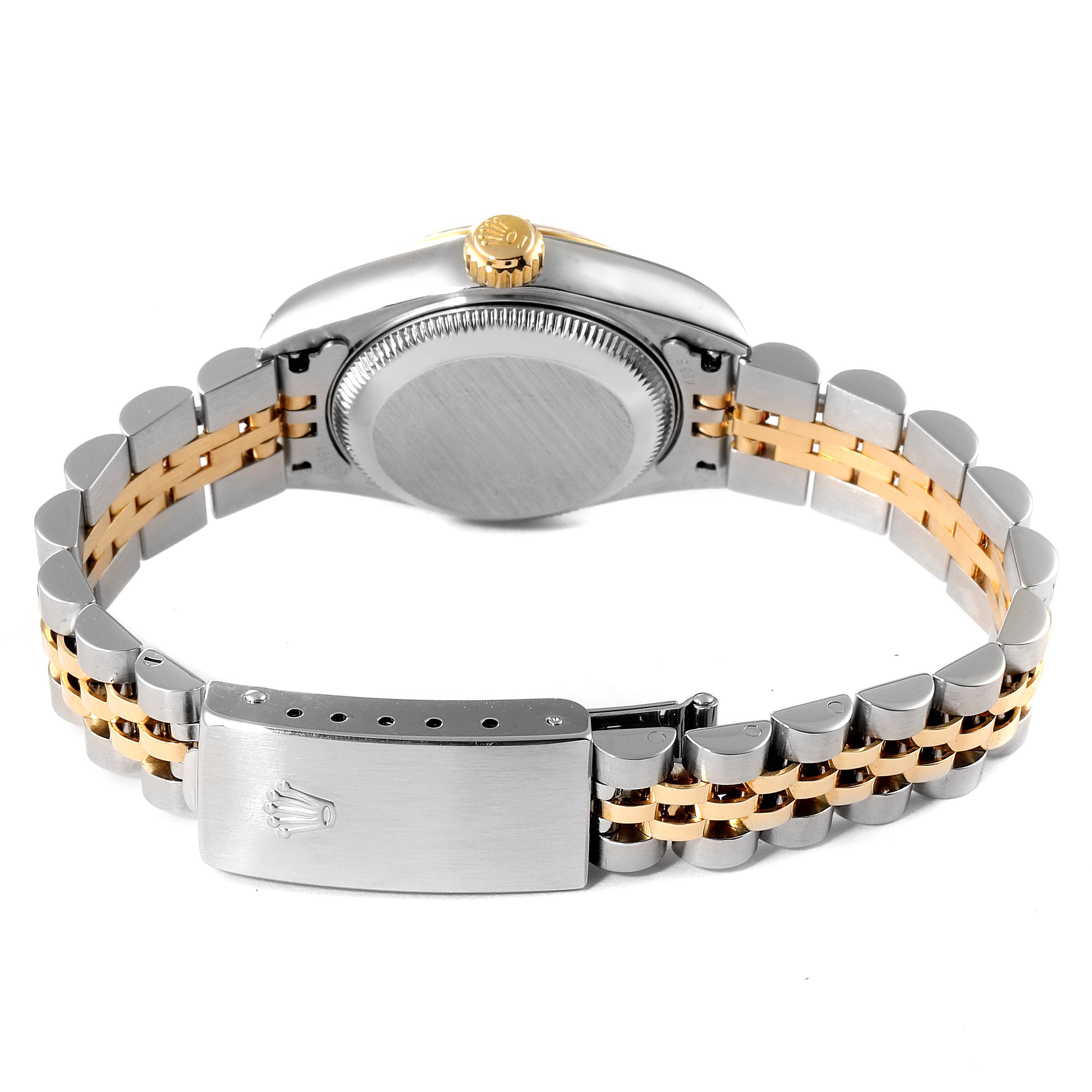The image shows the back and clasp of a Rolex Datejust 79173 Women's Steel and Gold (two tone) Beige Dial 79173 Women's Steel and Gold (two tone) Beige Dial watch, including the crown, case back, and two-tone bracelet.
