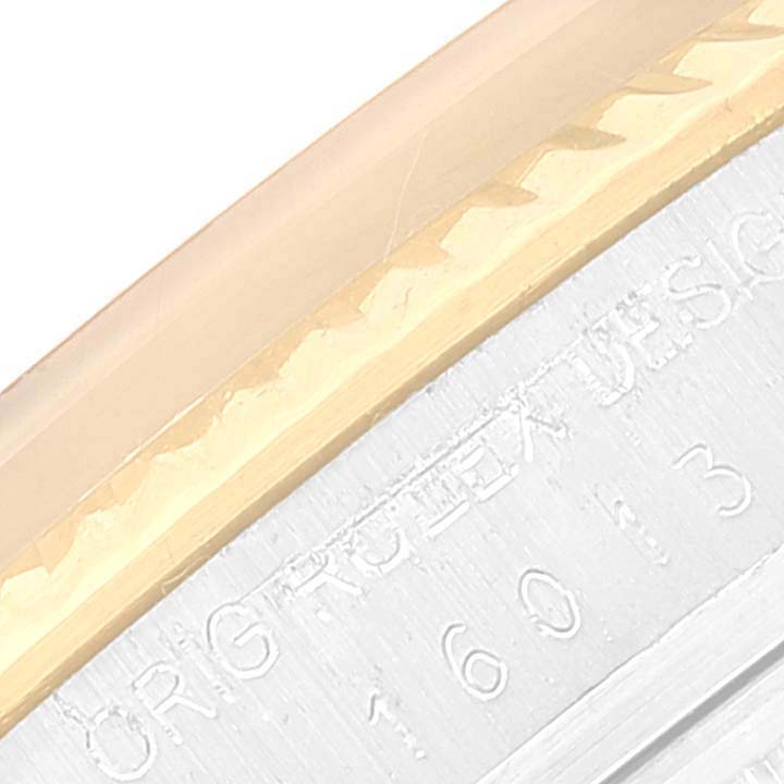 The image shows a close-up of the interior part of the bezel and case of a Rolex Datejust 16013 Men's Yellow Gold Champagne Dial 16013 Men's Yellow Gold Champagne Dial watch, revealing text and design details.