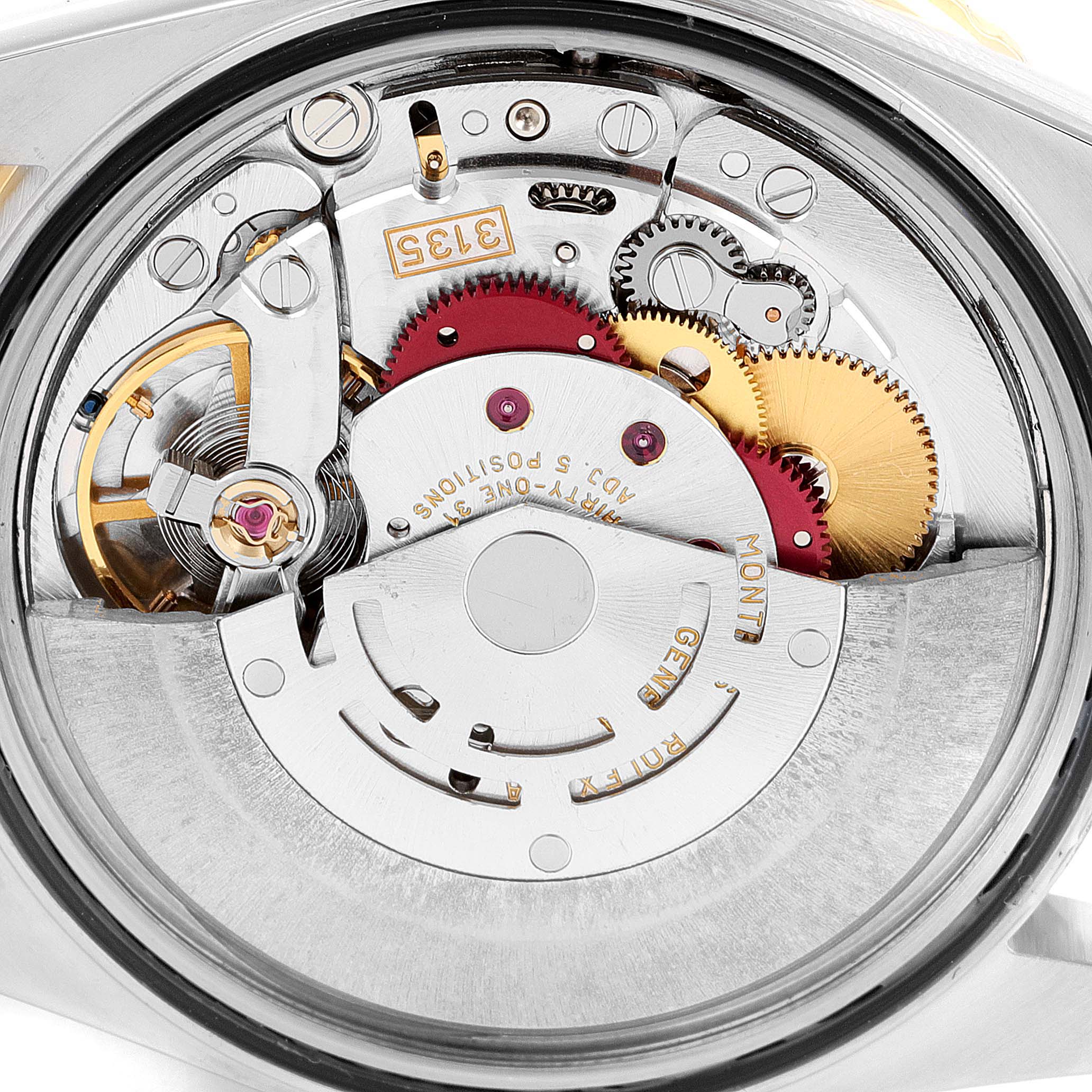 The image shows the inner mechanism of a Rolex Turn-o-Graph 16263 Men's Steel and Gold (two tone) Black Dial 16263 Men's Steel and Gold (two tone) Black Dial watch from a top-down angle, highlighting gears and components.