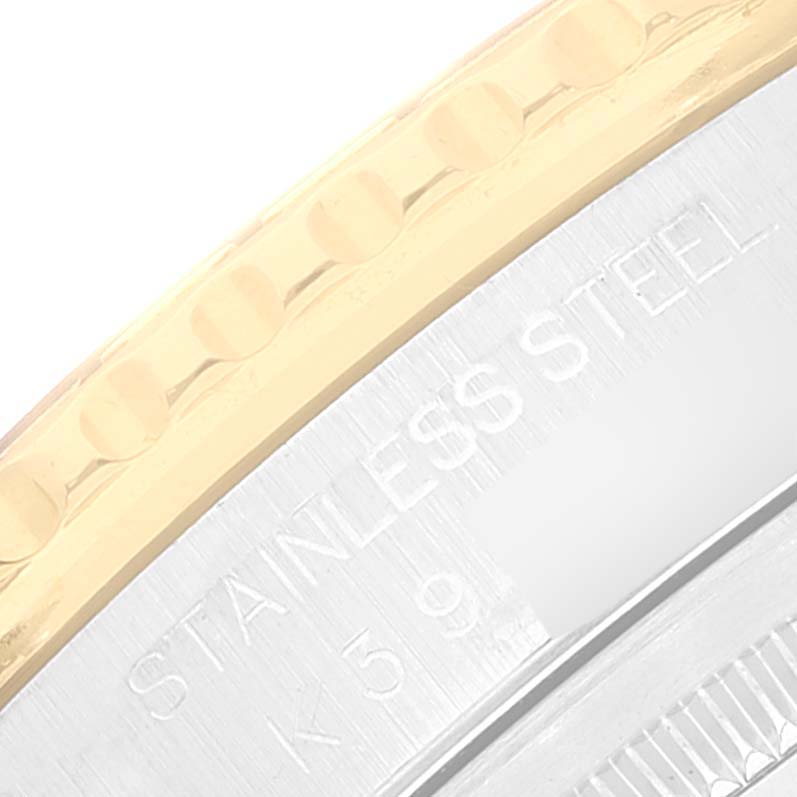 This image shows a close-up of the stainless steel case and the bezel of a Rolex Turn-o-Graph 16263 Men's Steel and Gold (two tone) White Dial 16263 Men's Steel and Gold (two tone) White Dial watch.