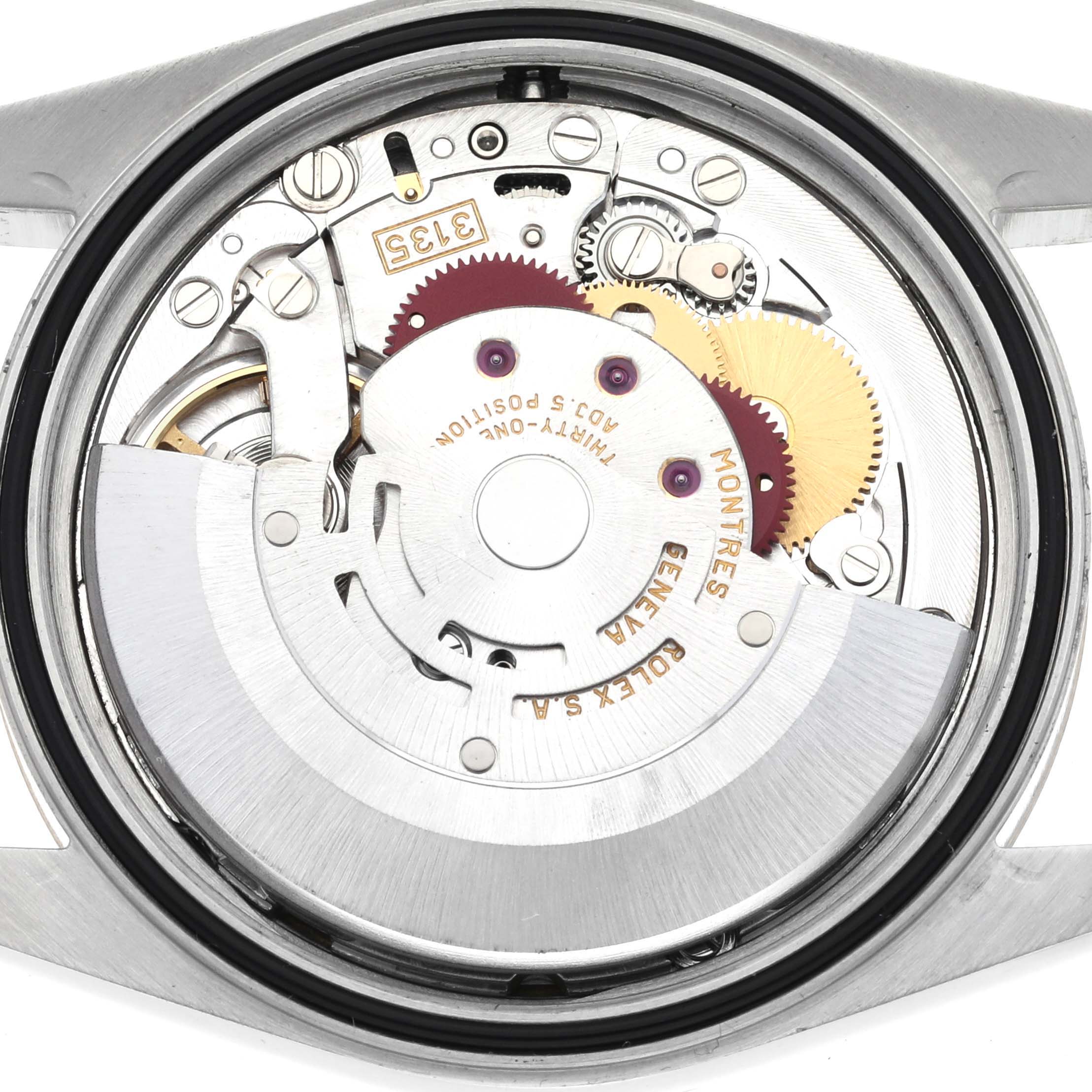 The image shows the inner mechanical movement of a Rolex Datejust 16233 Men
s Steel and Gold (two tone) White Dial 16233 Men
s Steel and Gold (two tone) White Dial watch, viewed from the back.