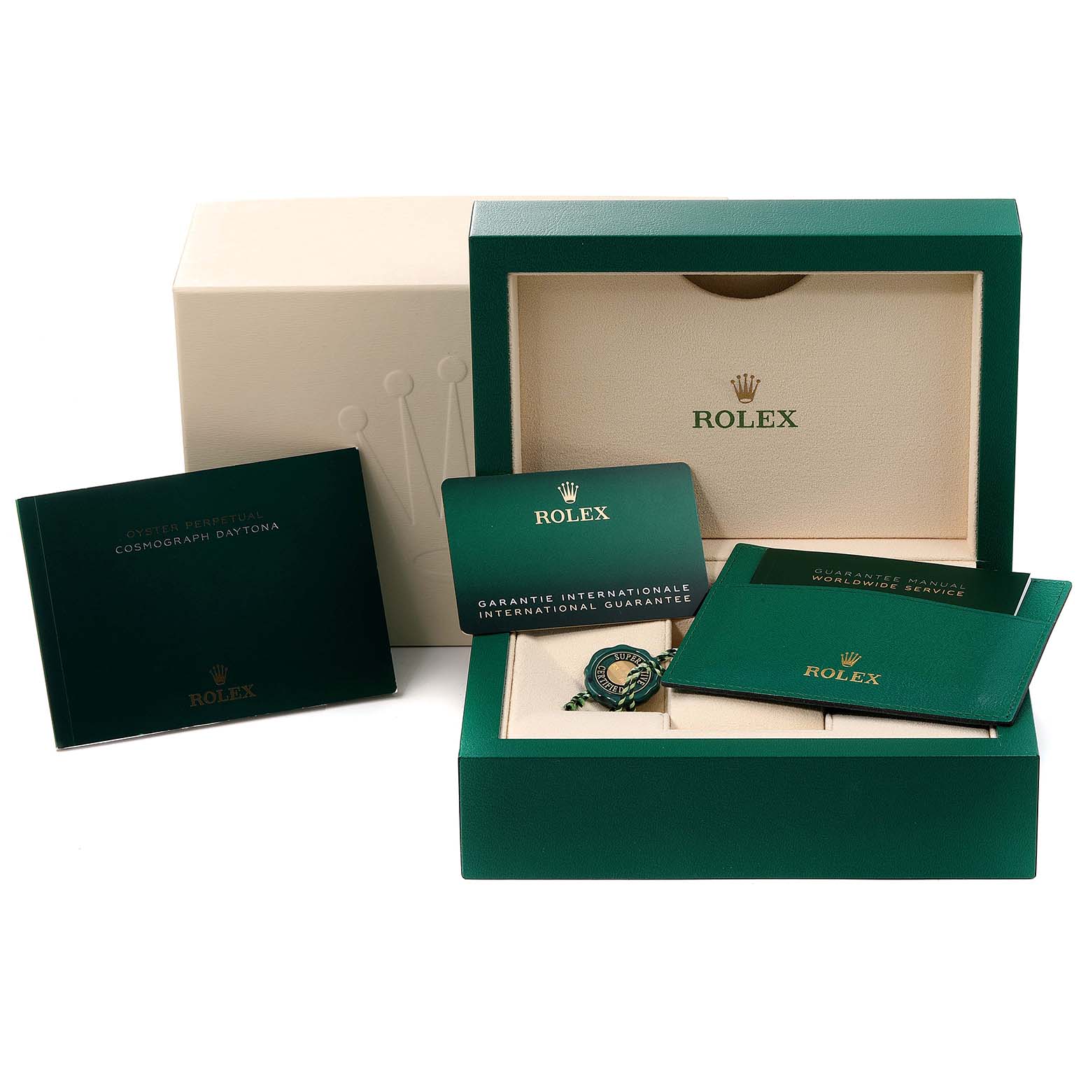This image shows the watch box and accessories, such as manuals, guarantee cards, and a tag for the Rolex Daytona 116500 Men's Stainless Steel White Dial 116500 Men's Stainless Steel White Dial model.