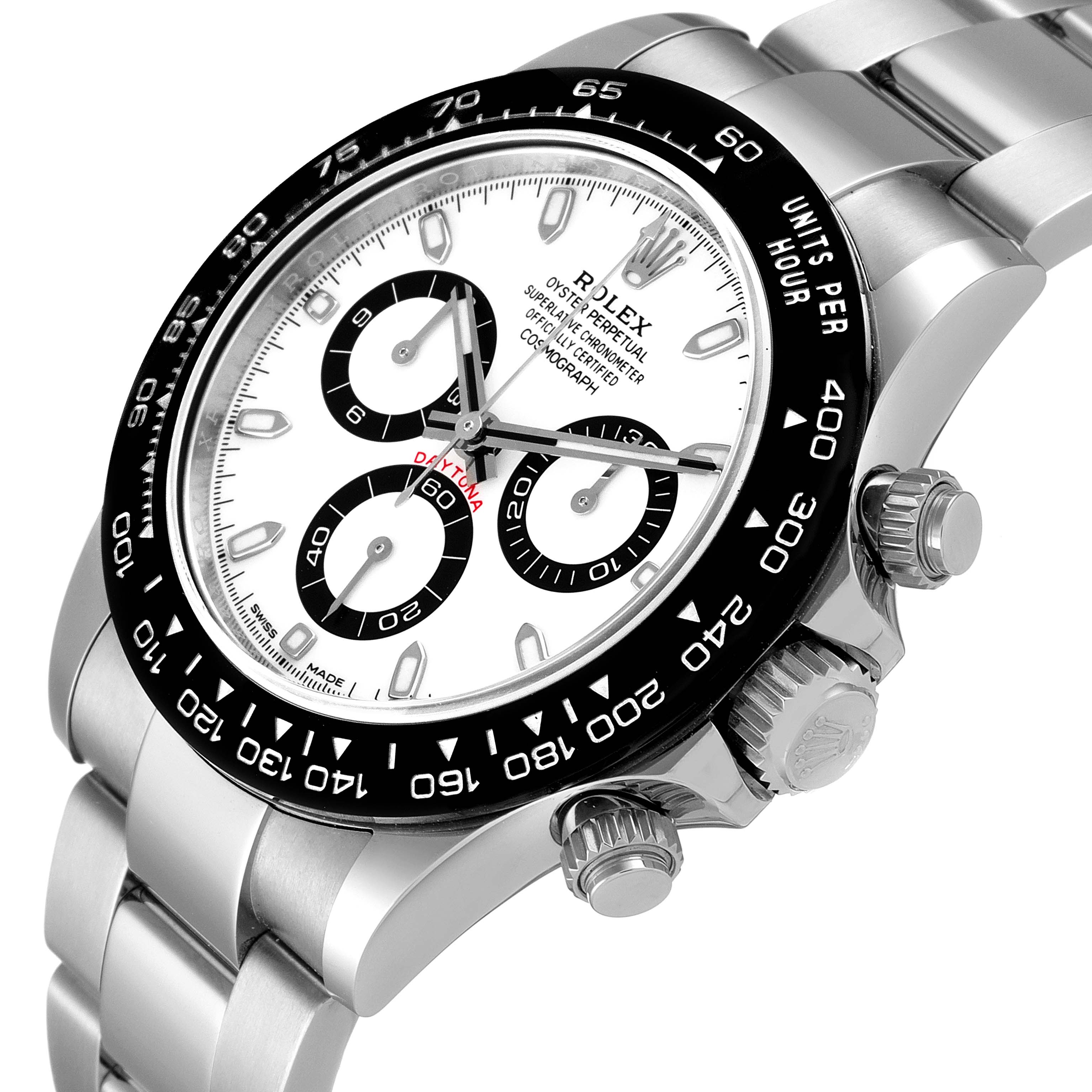 The image shows a close-up angle of a Rolex Daytona 116500 Men's Stainless Steel White Dial 116500 Men's Stainless Steel White Dial watch displaying the dial, bezel, and part of the bracelet.