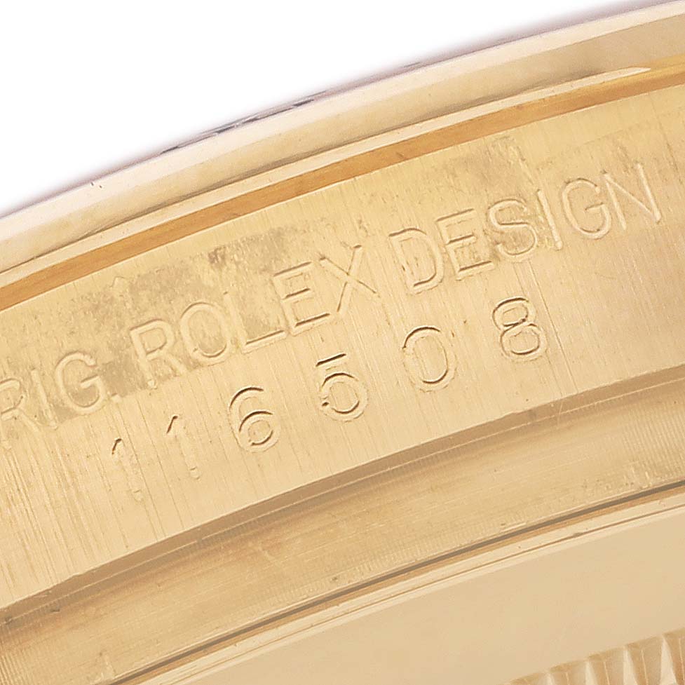 The image shows a close-up of the engraved side of a Rolex Daytona 116508 Men's Yellow Gold Mother of Pearl Dial 116508 Men's Yellow Gold Mother of Pearl Dial watch case, displaying its design and model number.