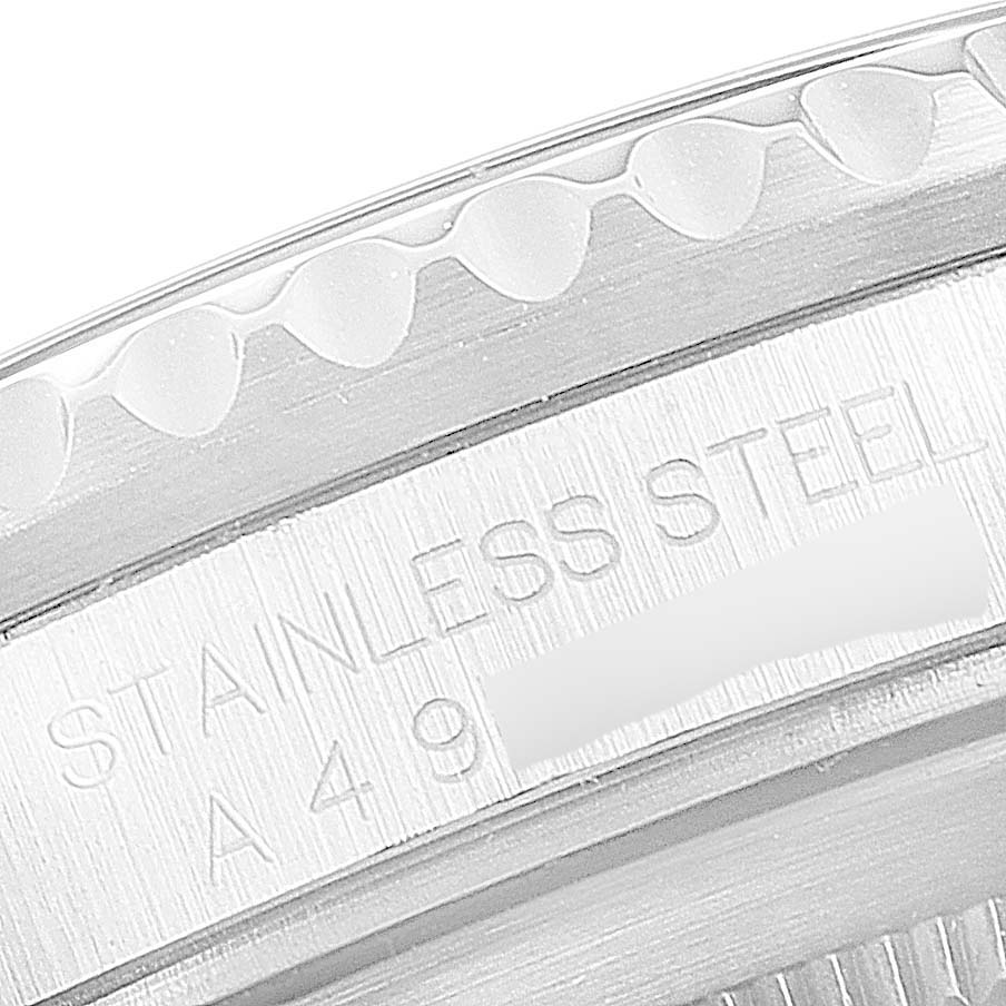 This image shows a close-up of the stainless steel casing and engraved text on a Rolex GMT-Master 16700 Men's Stainless Steel Black Dial 16700 Men's Stainless Steel Black Dial watch.
