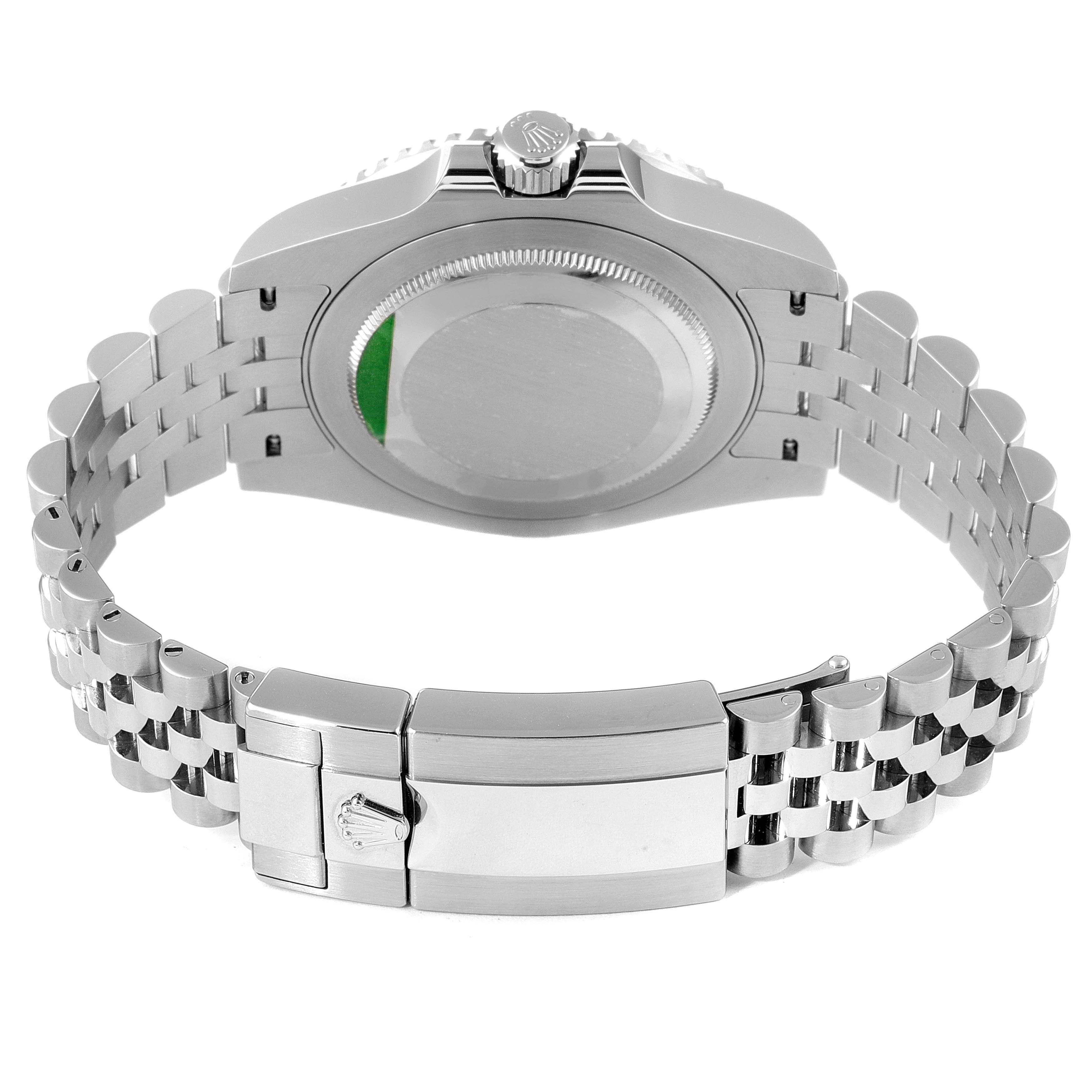 The image shows the case back, crown, and bracelet clasp of a Rolex GMT-Master 126710 Men
s Stainless Steel Black Dial 126710 Men
s Stainless Steel Black Dial watch from a rear angle.