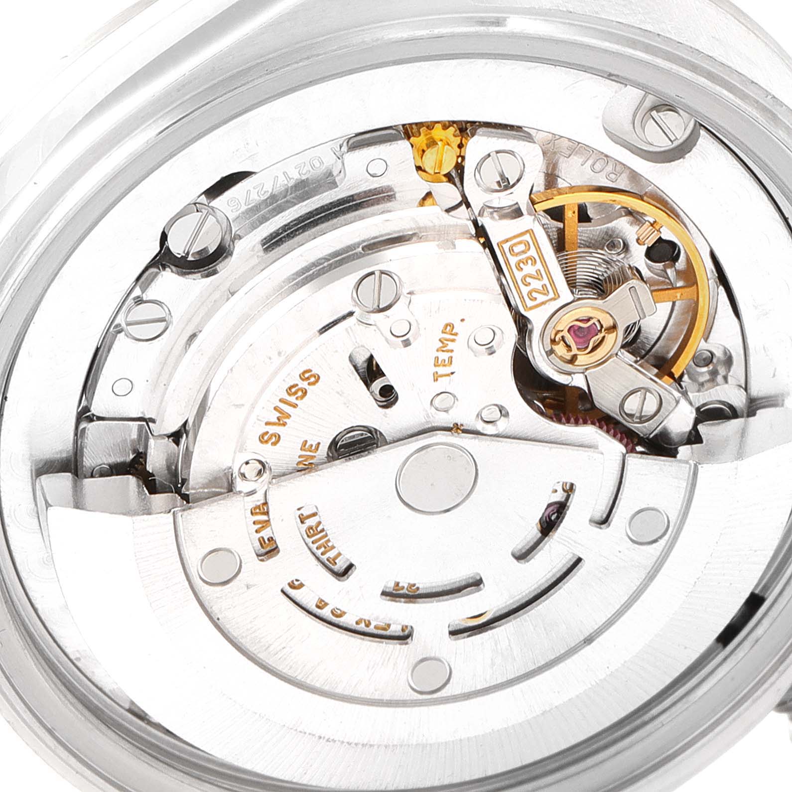 This image shows a close-up of the movement mechanism of a Rolex Mid-Size 77080 Women's Stainless Steel Black Dial 77080 Women's Stainless Steel Black Dial watch.