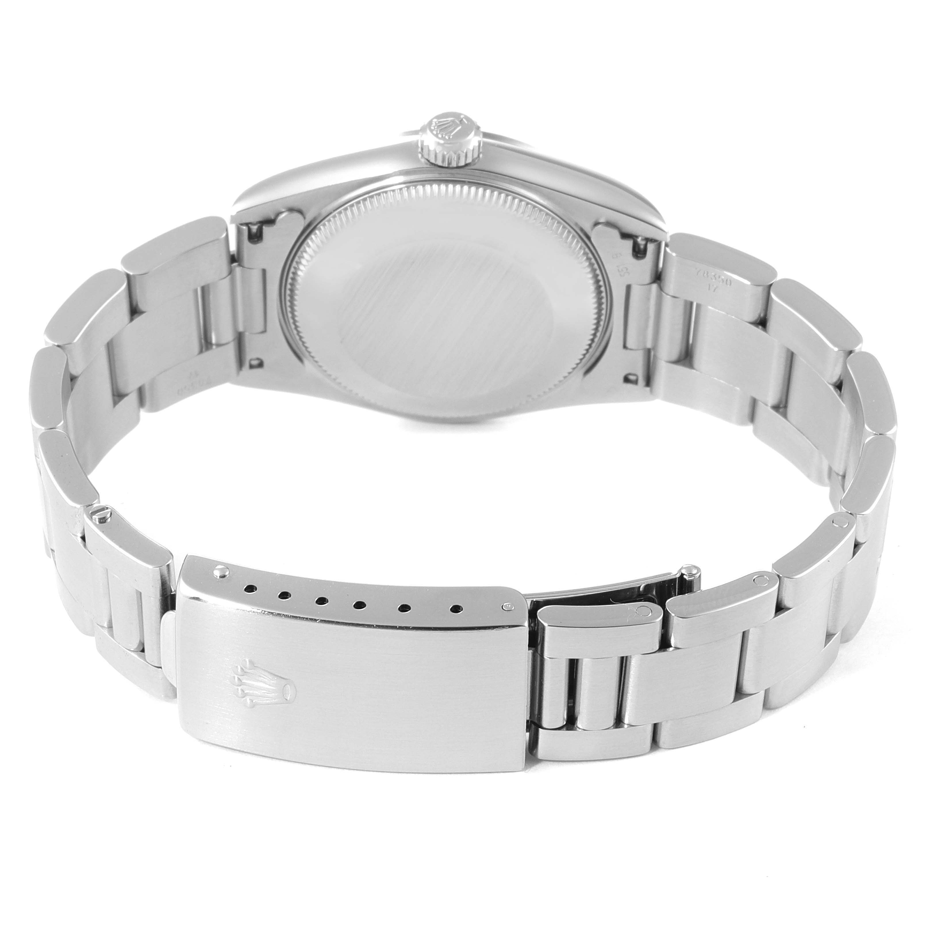 This image shows the backside and bracelet clasp of a Rolex Mid-Size 77080 Women's Stainless Steel Black Dial 77080 Women's Stainless Steel Black Dial model watch.