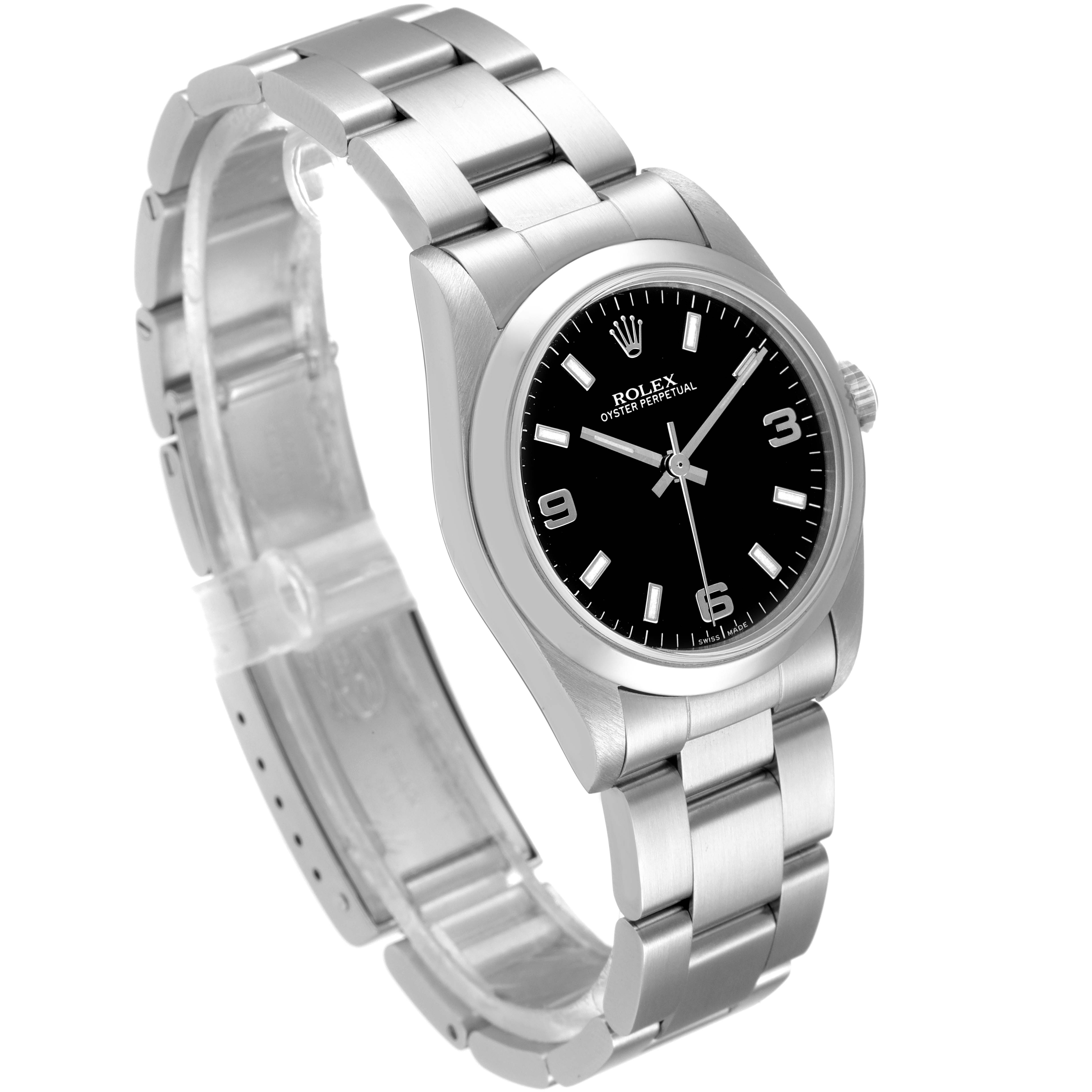 This image shows a Rolex Oyster Perpetual Mid-Size watch at a tilted angle, highlighting the black dial, silver bezel, and stainless steel bracelet.