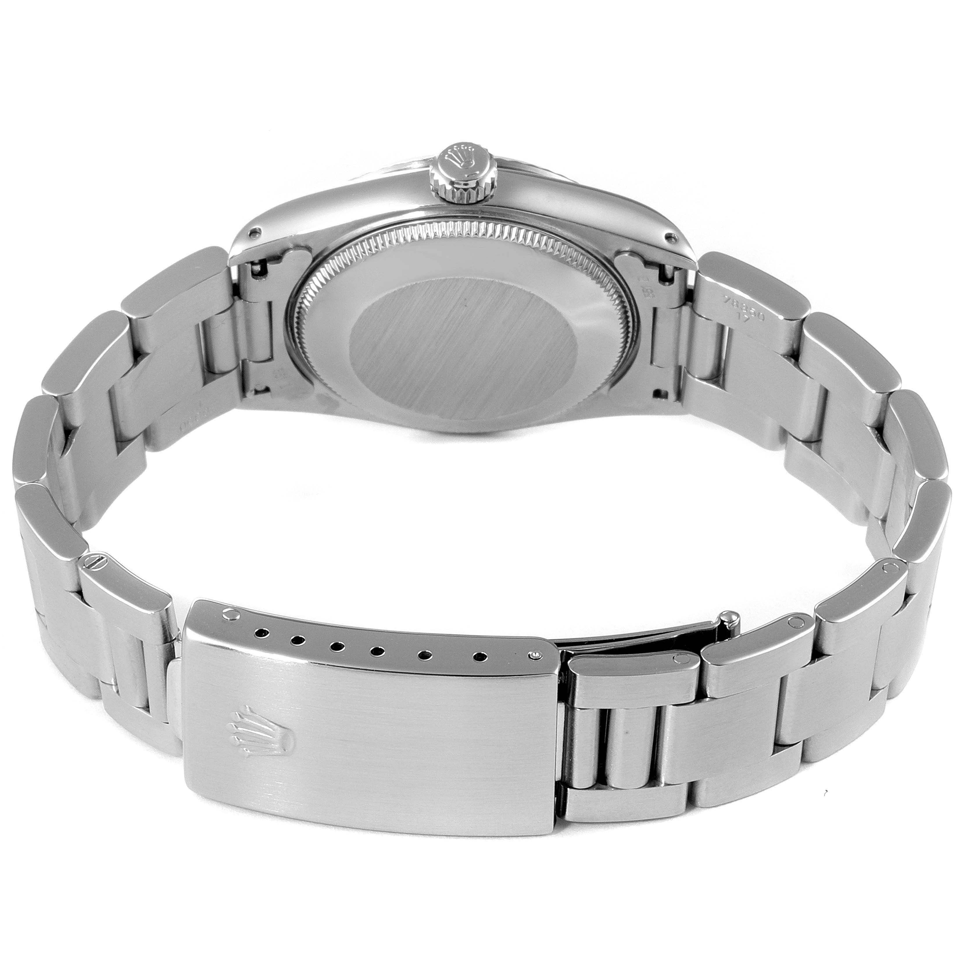 This image shows the back and clasp of a Rolex Mid-Size 67514 Women's Stainless Steel Black Dial 67514 Women's Stainless Steel Black Dial model watch from a rear angle.