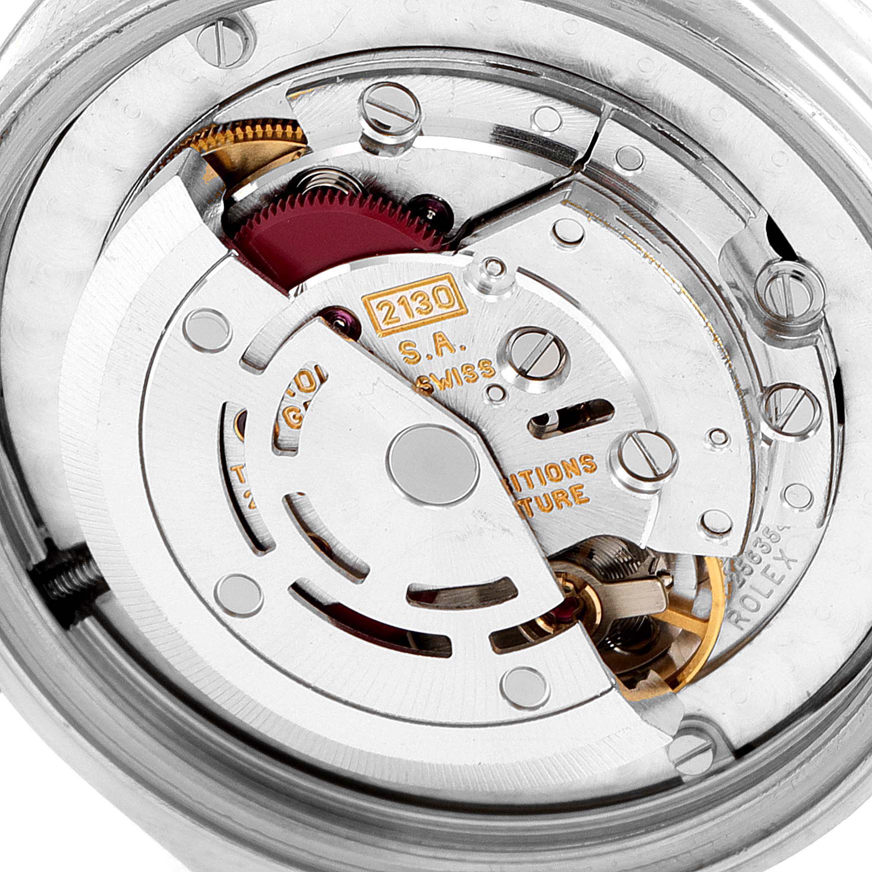 This image shows a detailed close-up of the movement mechanism of a Rolex Mid-Size 67514 Women's Stainless Steel Black Dial 67514 Women's Stainless Steel Black Dial model watch.