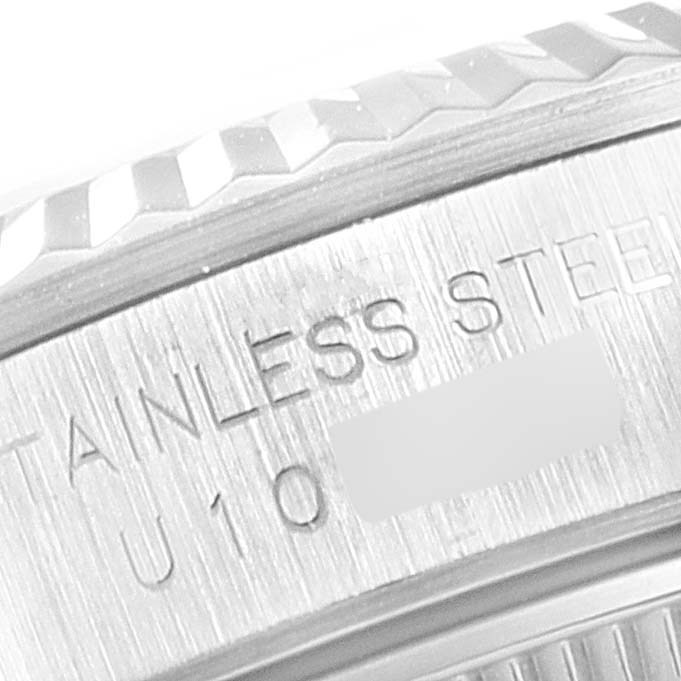 This image shows a close-up of the bezel and the inscription on the case side of a Rolex Oyster Perpetual 67194 Women's Stainless Steel Black Dial 67194 Women's Stainless Steel Black Dial watch.