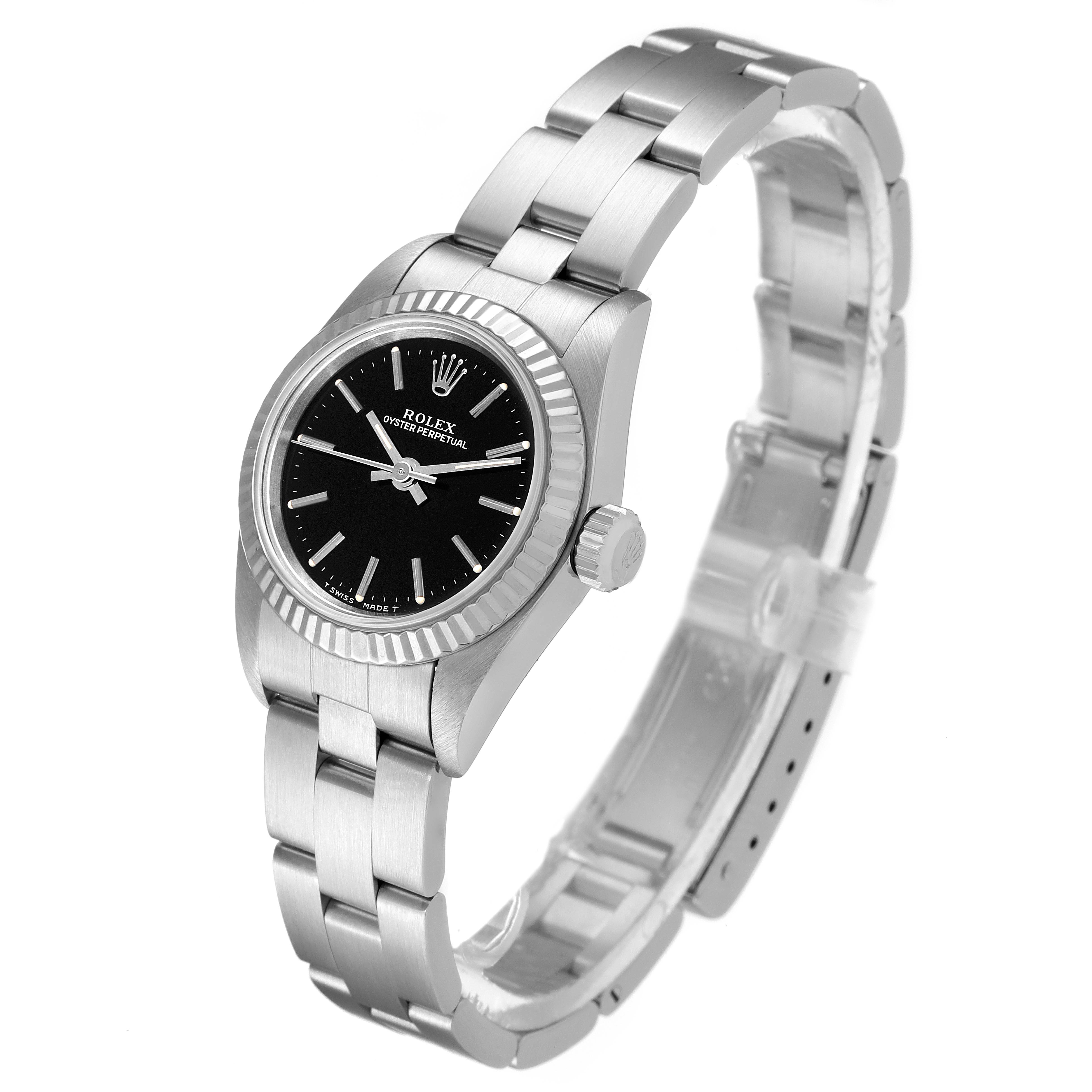 This image shows a side angle of the Rolex Oyster Perpetual 67194 Women's Stainless Steel Black Dial 67194 Women's Stainless Steel Black Dial watch, highlighting its bracelet, case, and black dial.