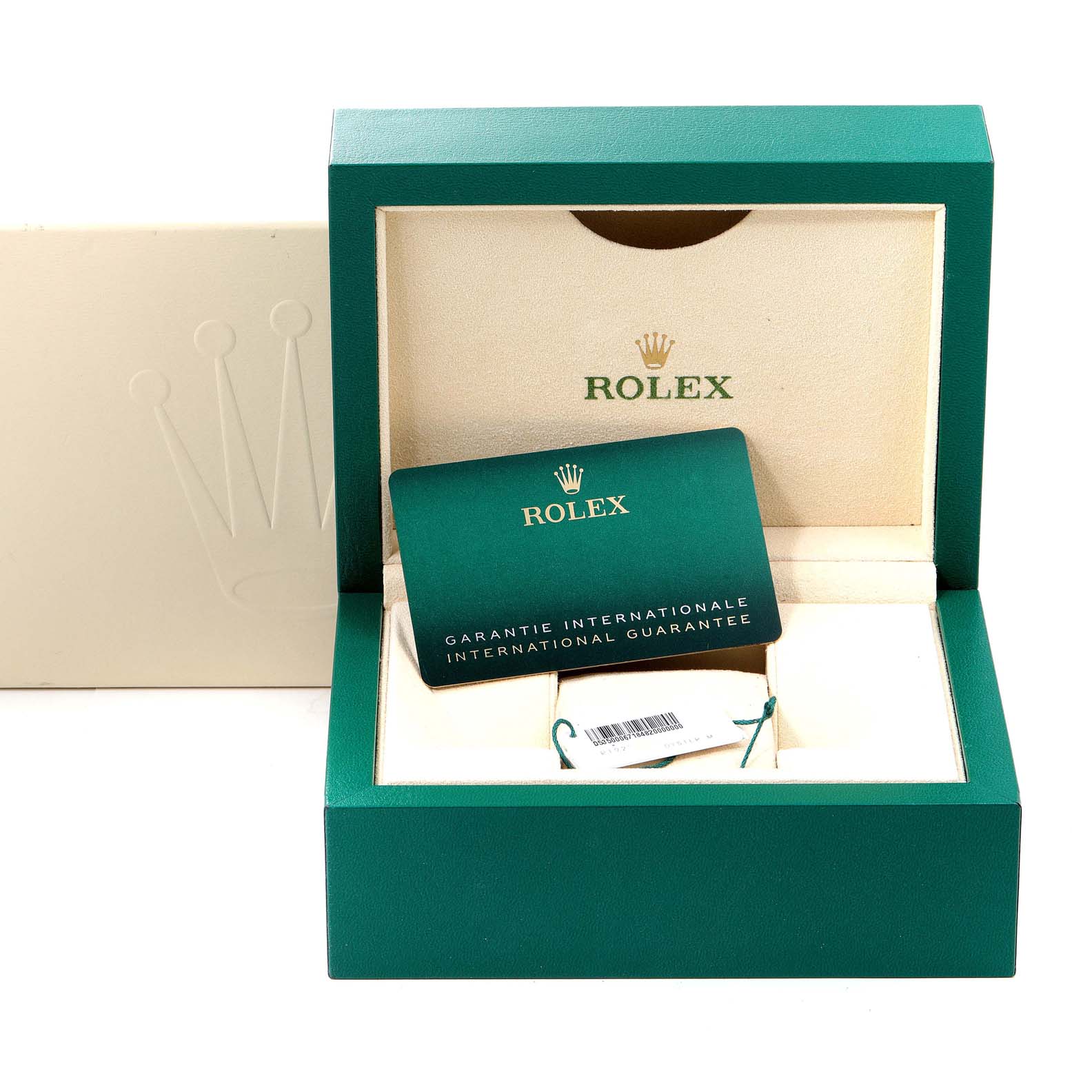 The image shows the Rolex Oyster Perpetual 124300 Men's Stainless Steel Silver Dial 124300 Men's Stainless Steel Silver Dial box containing the international guarantee card and a tag.