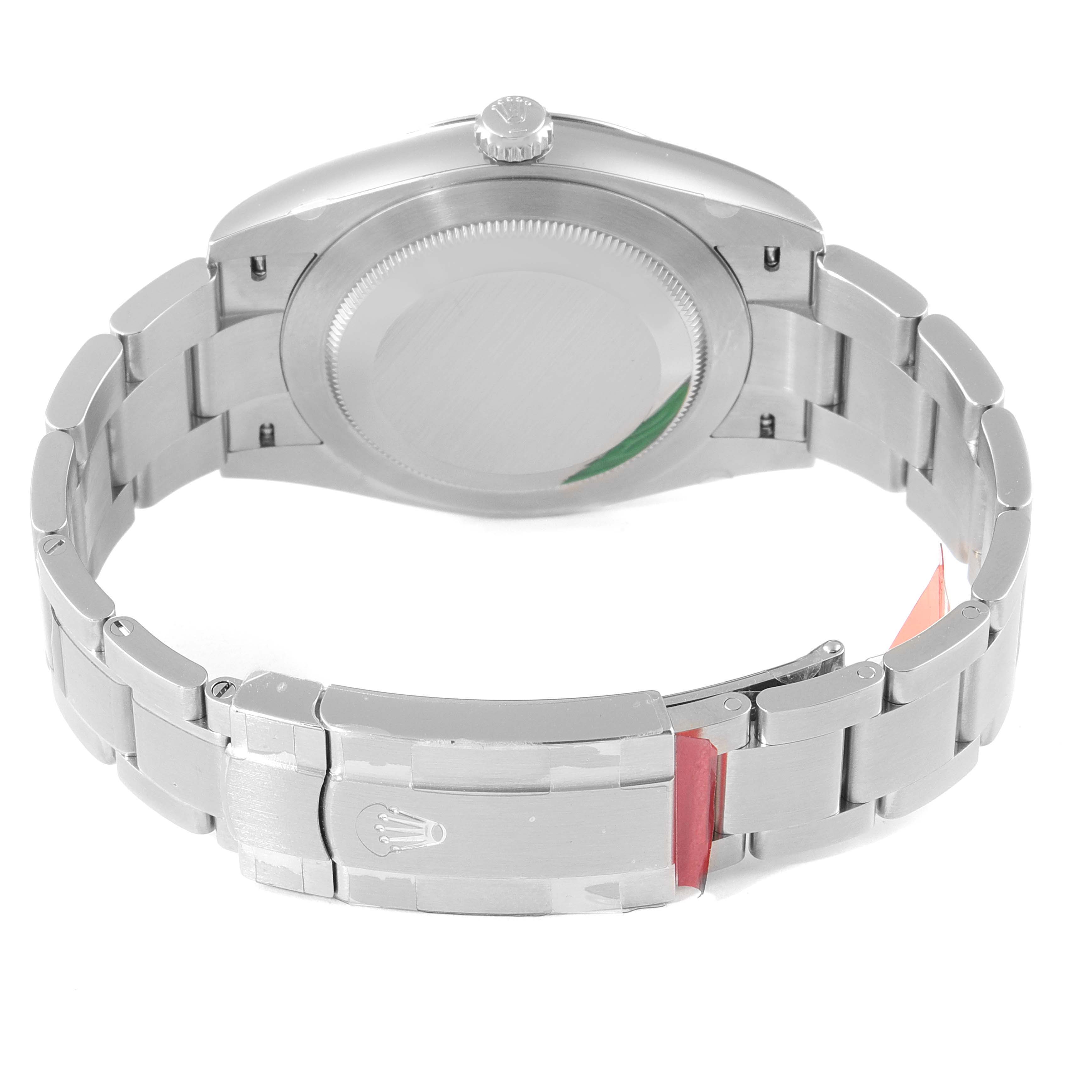 The image shows a rear view of the Oyster Perpetual Rolex watch, highlighting the case back, bracelet, and clasp.