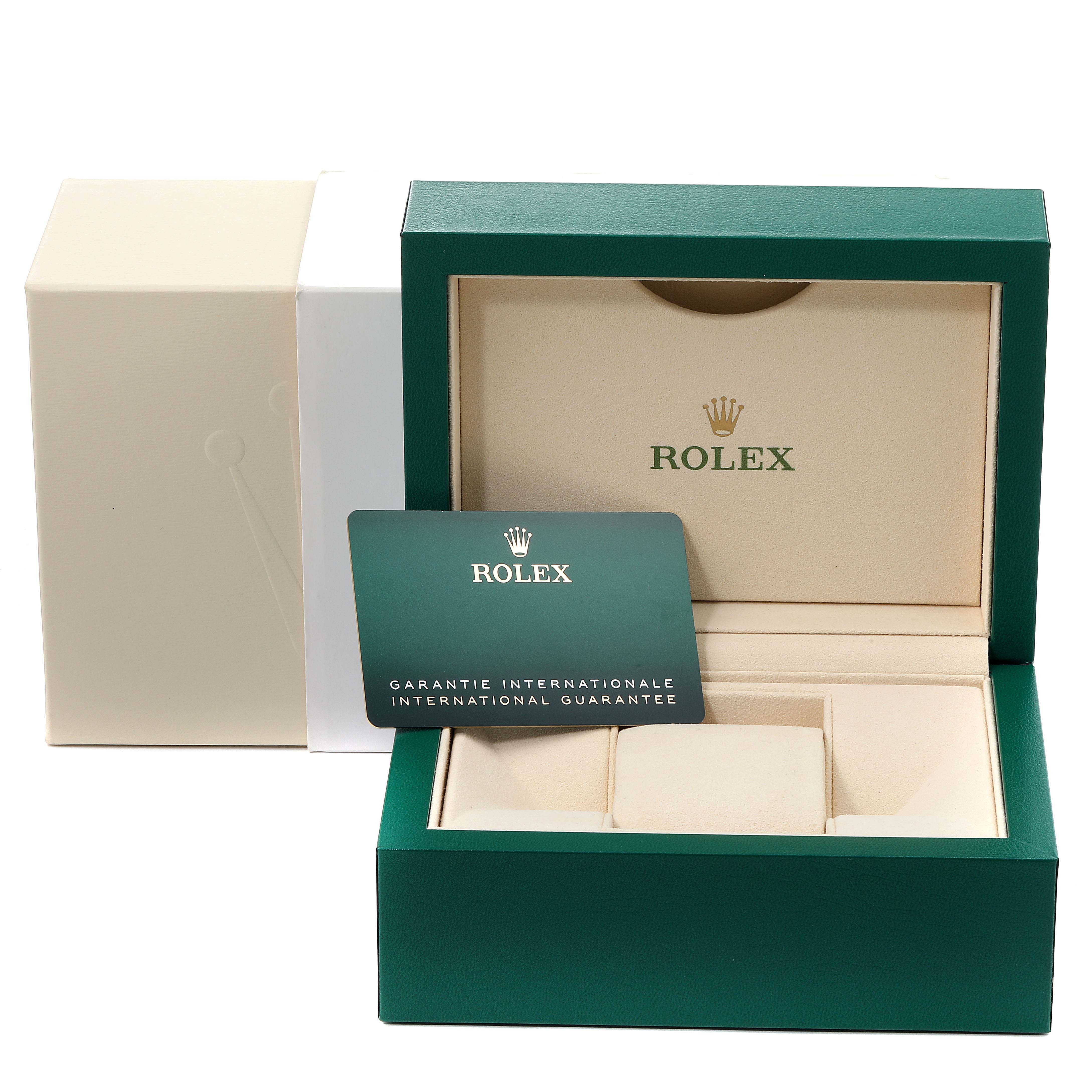 The image shows an open Rolex Air-King 116900 Men's Stainless Steel Black Dial 116900 Men's Stainless Steel Black Dial watch box with a Garantie Internationale card inside.