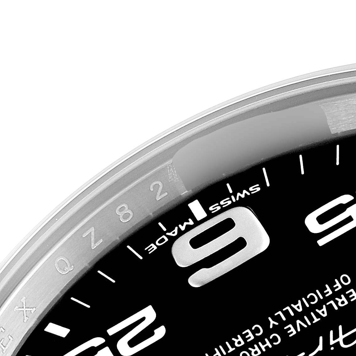 The image shows a close-up angle of the dial and bezel of a Rolex Air-King 116900 Men's Stainless Steel Black Dial 116900 Men's Stainless Steel Black Dial watch, highlighting numbers and lettering.