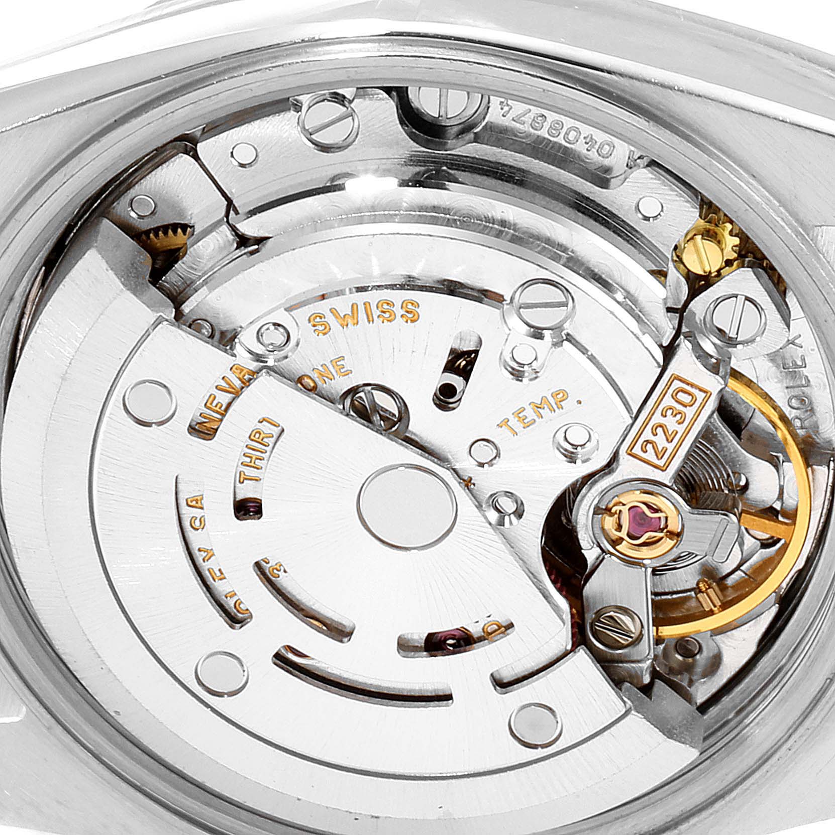 This image shows a close-up view of the internal movement components of a Rolex Oyster Perpetual 76183 Women's Steel and Gold (two tone) Grey Dial 76183 Women's Steel and Gold (two tone) Grey Dial watch, model 2230.