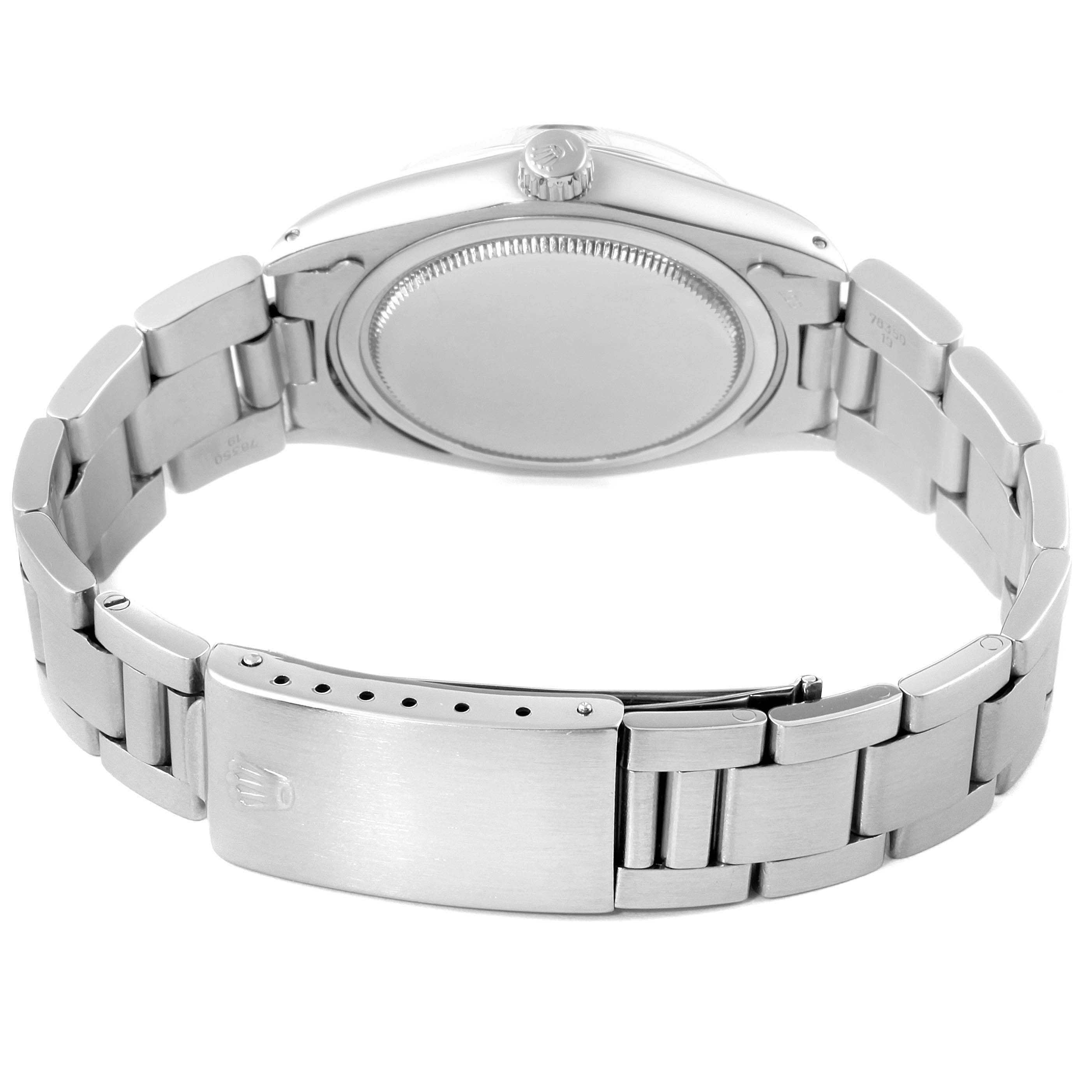 This image shows the backside and clasp of the Rolex Vintage Collection 6694 Men's Stainless Steel Black Dial 6694 Men's Stainless Steel Black Dial watch, highlighting the metal bracelet and case back.