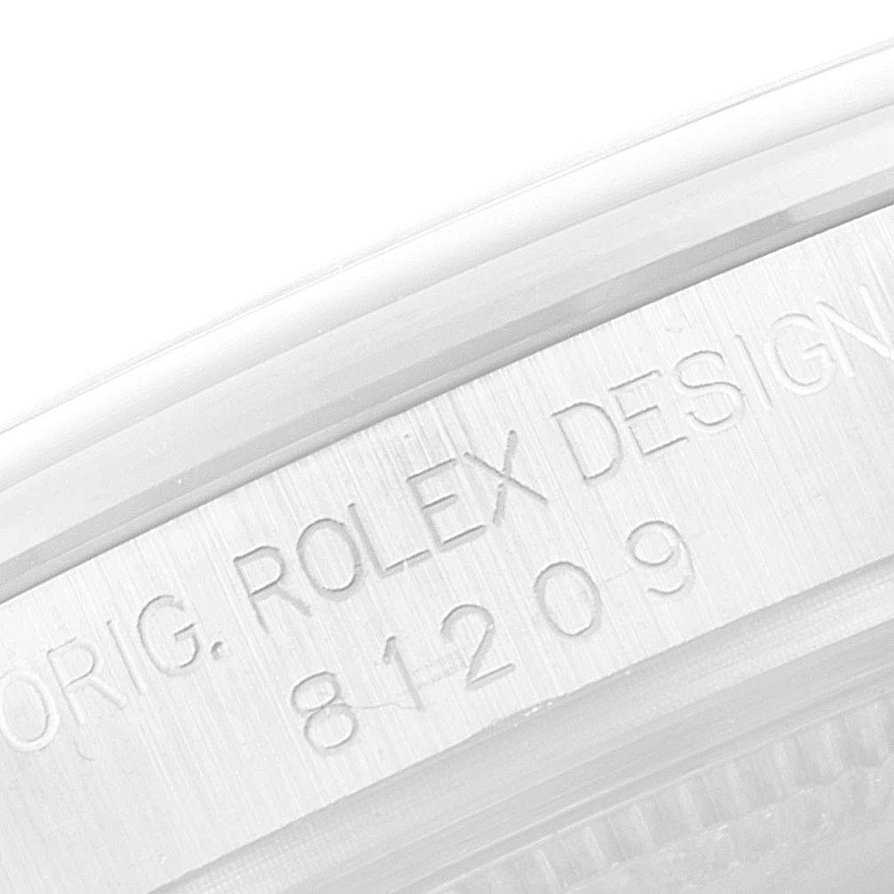 This image shows a close-up of the case side engraving on a Rolex Pearlmaster 81319 Women's White Gold Mother of Pearl Dial 81319 Women's White Gold Mother of Pearl Dial watch.