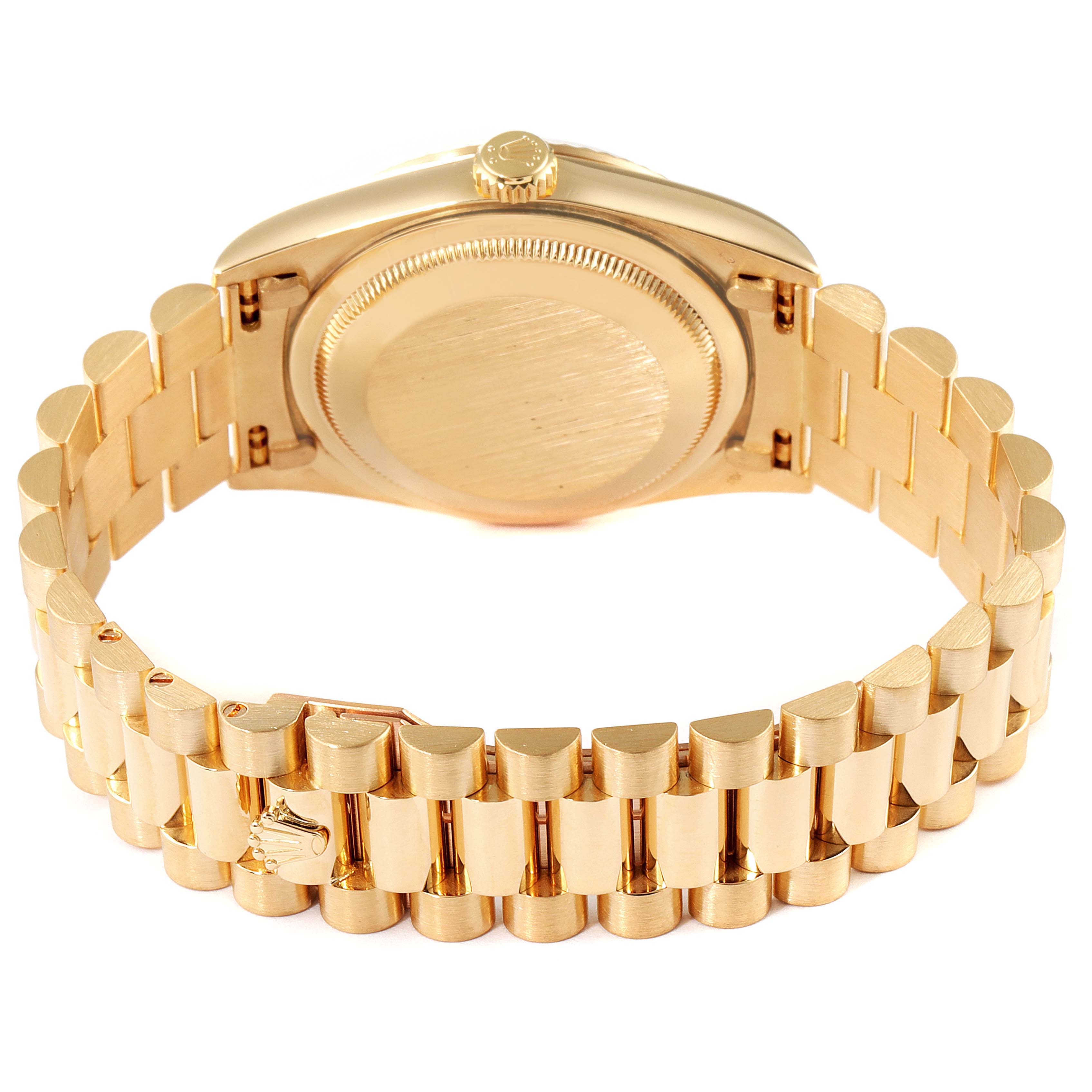 This image shows the case back and bracelet of a Rolex President 18238 Men's Yellow Gold Champagne Dial 18238 Men's Yellow Gold Champagne Dial model watch from a rear angle.