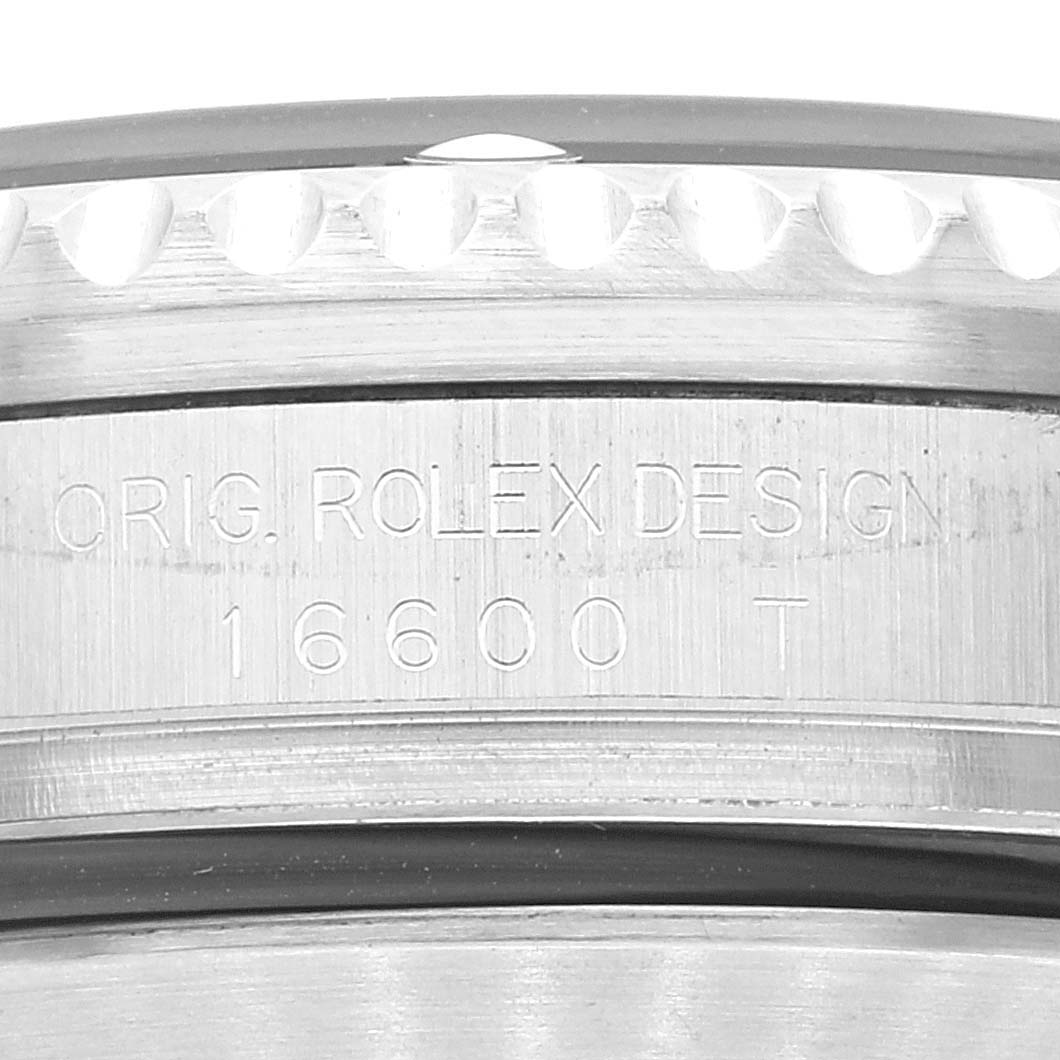 The image shows a close-up of the side engraving on a Rolex Sea-Dweller 16600T Men's Stainless Steel Black Dial 16600T Men's Stainless Steel Black Dial model 16600, highlighting the "ORIG. ROLEX DESIGN" inscription.