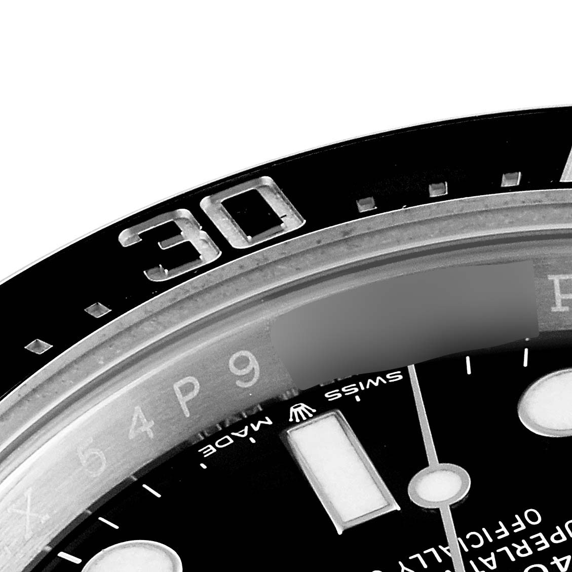 This image shows a close-up of the bezel and part of the dial of the Rolex Sea-Dweller 126600 Men's Stainless Steel Black Dial 126600 Men's Stainless Steel Black Dial watch, including the "30" mark.