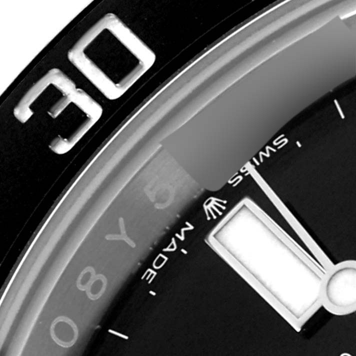 The image shows a close-up of the dial and bezel of a Rolex Submariner 126610 Men
s Stainless Steel Black Dial 126610 Men
s Stainless Steel Black Dial, highlighting the 30-minute marker.