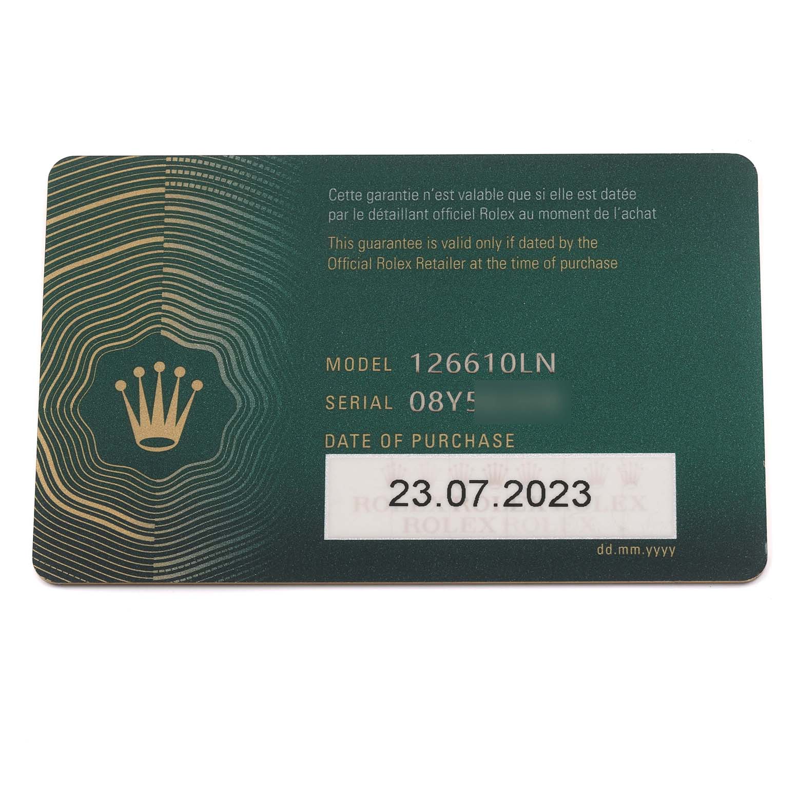 The image shows a Rolex Submariner 126610 Men
s Stainless Steel Black Dial 126610 Men
s Stainless Steel Black Dial warranty card from a top-down angle.