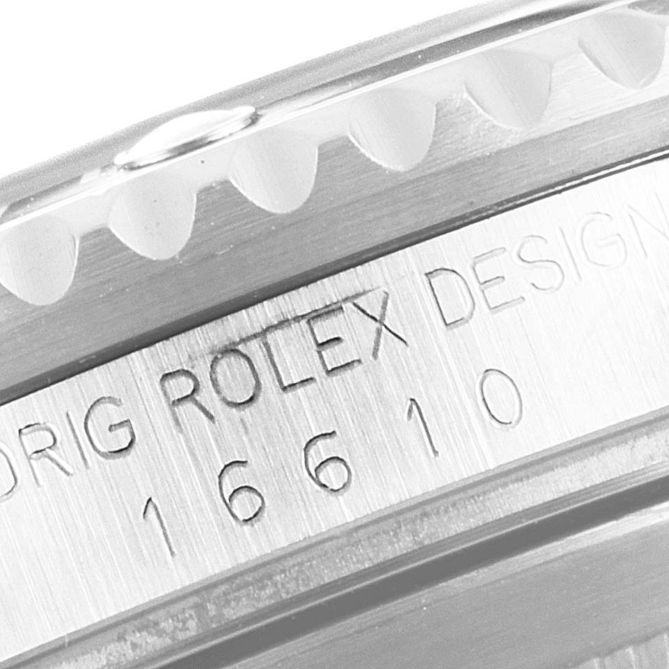 This image shows a close-up of the engraved model number and design details on the side of the Rolex Submariner 16610 Men's Stainless Steel Black Dial 16610 Men's Stainless Steel Black Dial watch case.