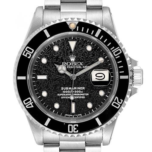 The image shows the front face of the Rolex Submariner watch, highlighting the dial, bezel, date window, and part of the bracelet.