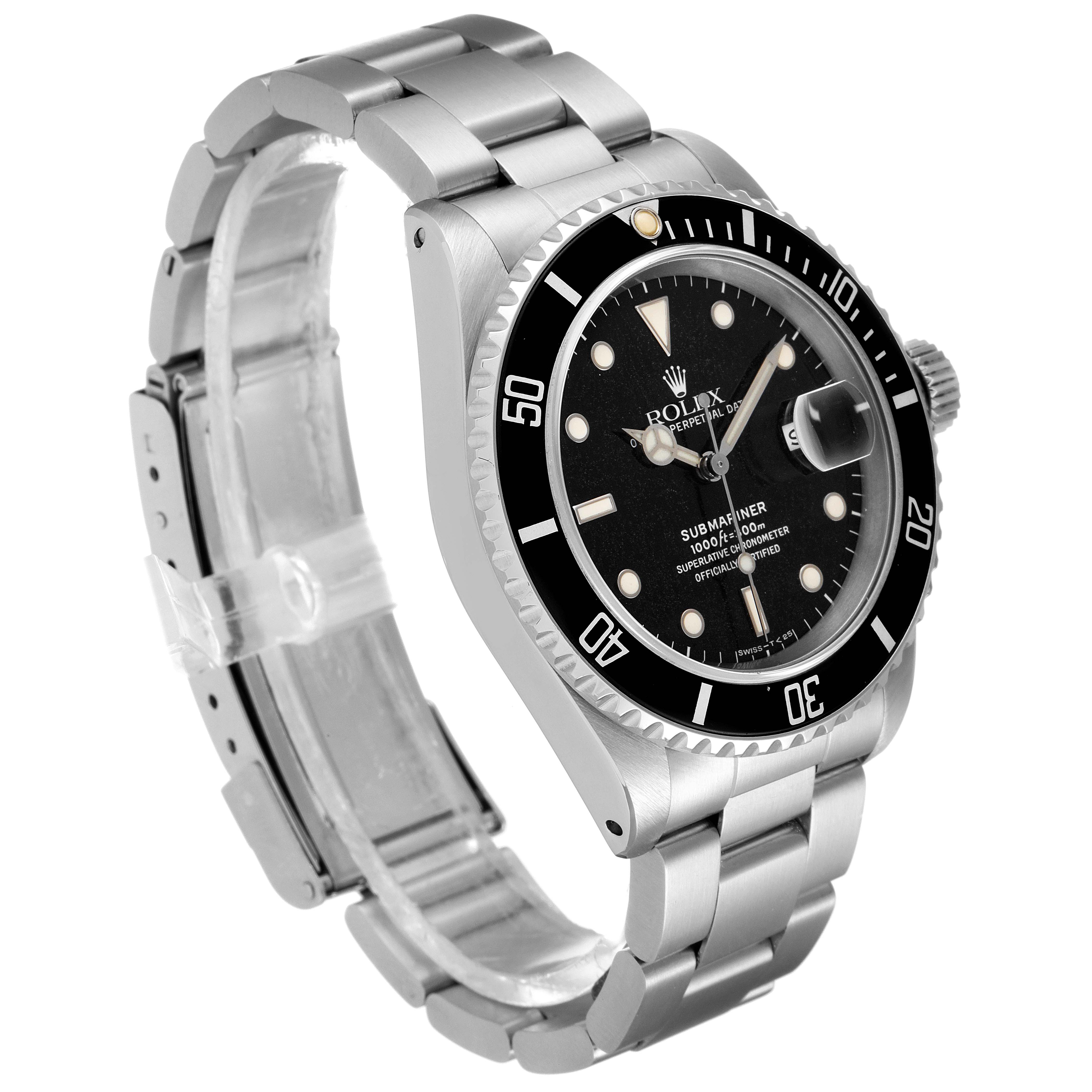 The Rolex Submariner 16610 Men's Stainless Steel Black Dial 16610 Men's Stainless Steel Black Dial watch is shown at an angle highlighting its black dial, rotating bezel, stainless steel bracelet, and crown.