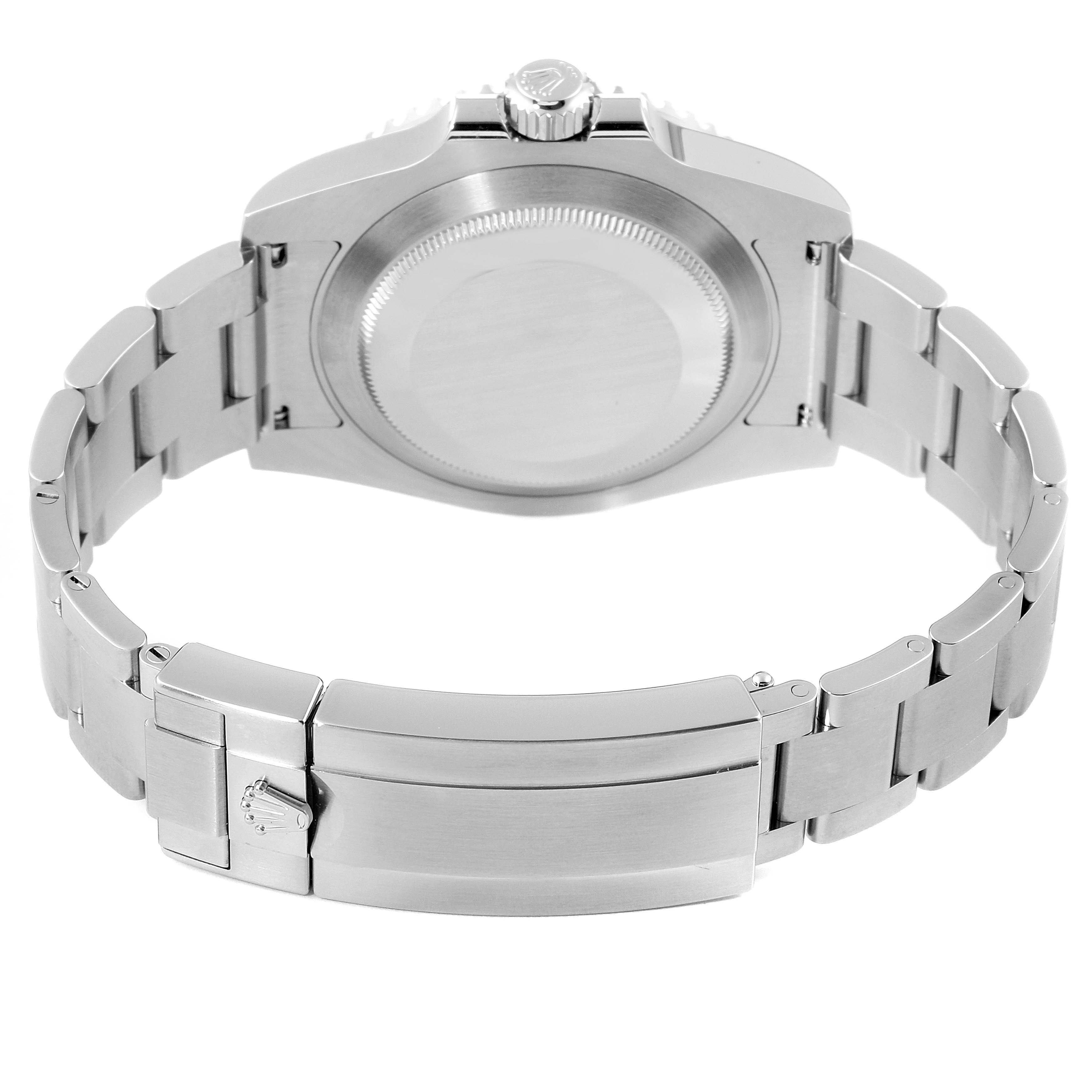 This image shows the back view of a Rolex Submariner 116610 Men's Stainless Steel Black Dial 116610 Men's Stainless Steel Black Dial watch focusing on the case back and the bracelet clasp.