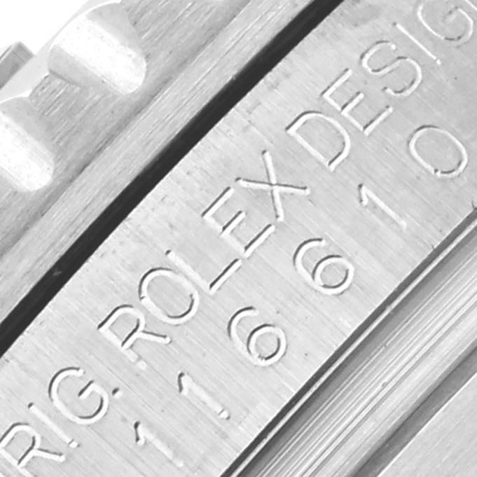 The image shows a close-up of the side engraving on a Rolex Submariner 116610 Men
s Stainless Steel Black Dial 116610 Men
s Stainless Steel Black Dial
s case, displaying "Rolex Design" and the model number.