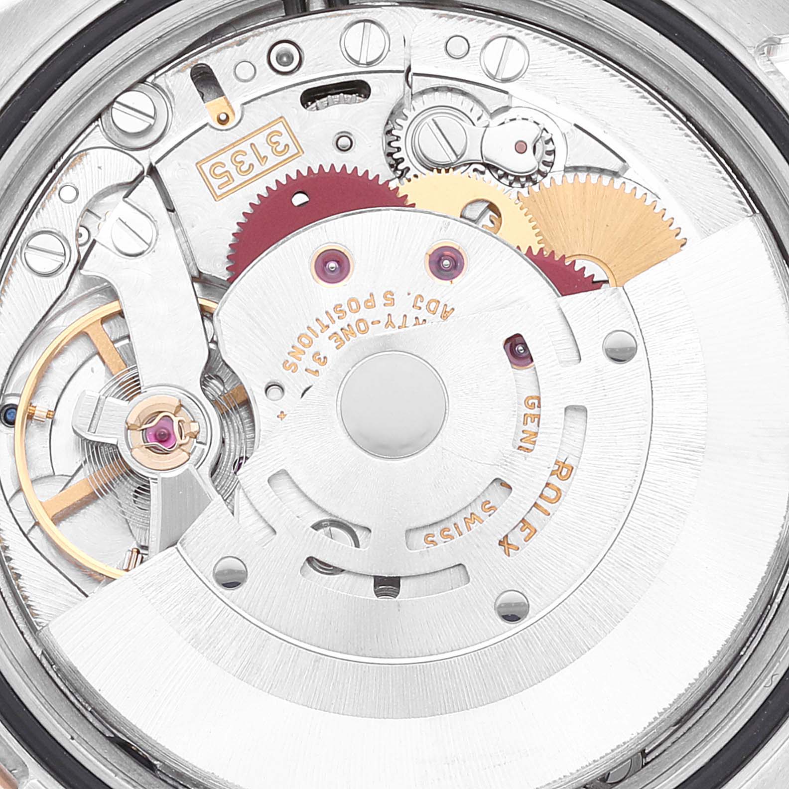 Close-up of the internal mechanism of a Rolex Turn-o-Graph 116261 Men's Steel and Gold (two tone) Silver Dial 116261 Men's Steel and Gold (two tone) Silver Dial watch, showing gears and other components.