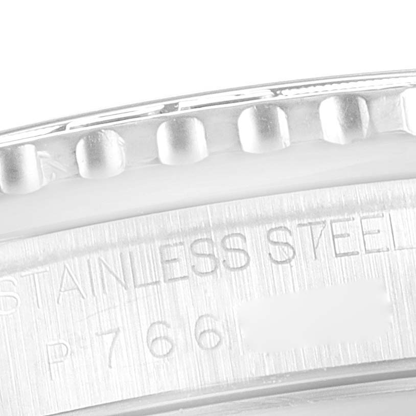This image shows a close-up of the bezel and case back engraving of a Rolex Turn-o-Graph 16264 Men's Stainless Steel Black Dial 16264 Men's Stainless Steel Black Dial watch.