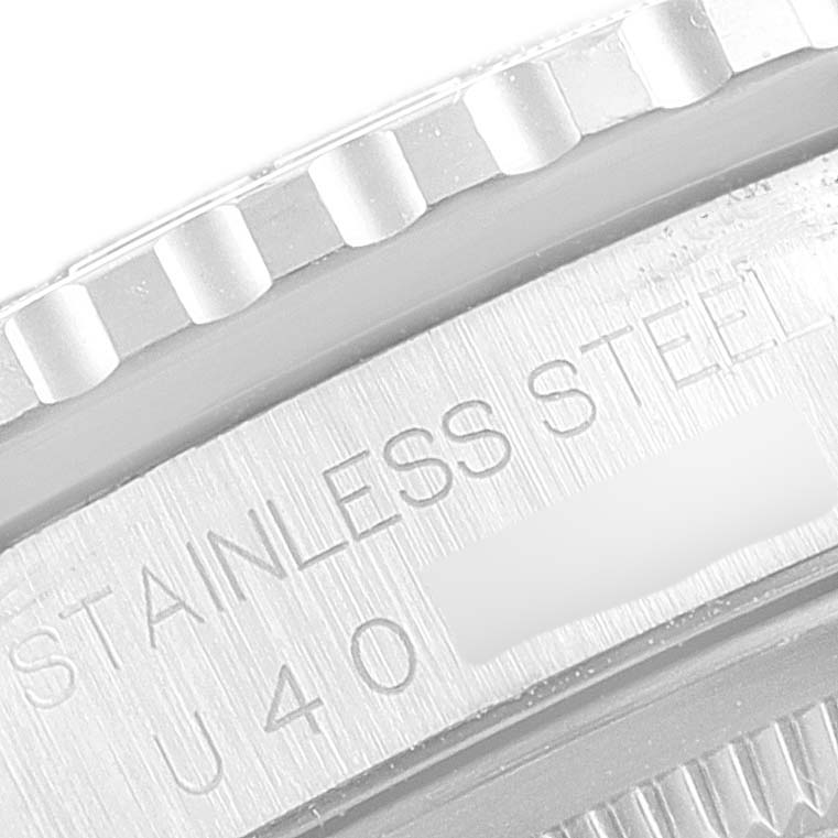 This image shows a close-up of the bezel and case marking of a Rolex Turn-o-Graph 16264 Men's Stainless Steel Black Dial 16264 Men's Stainless Steel Black Dial, focusing on the "Stainless Steel" engraving.