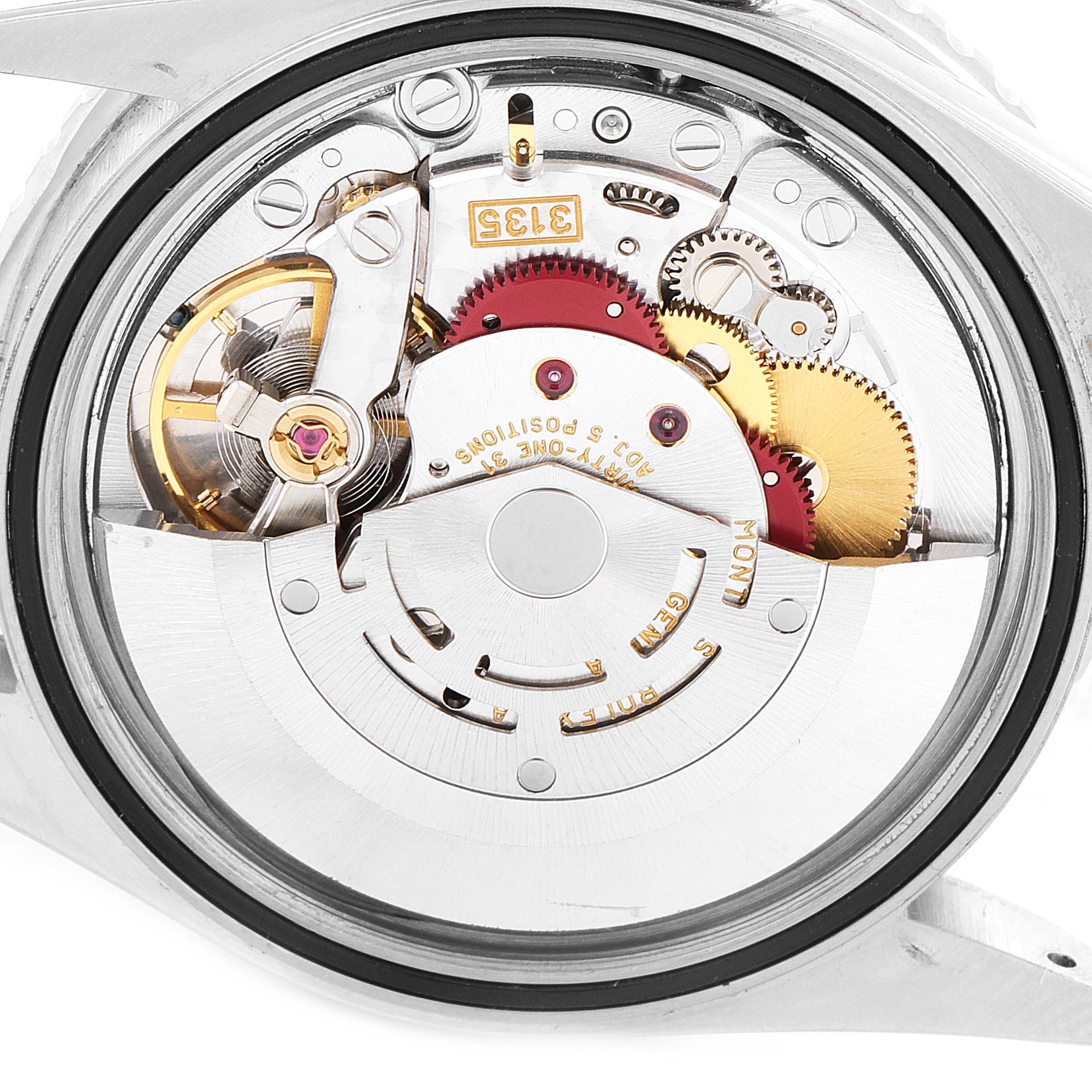 This image shows the inner mechanism of a Rolex Turn-o-Graph 16264 Men's Stainless Steel Black Dial 16264 Men's Stainless Steel Black Dial watch from a back view, detailing its intricate gears and movement.