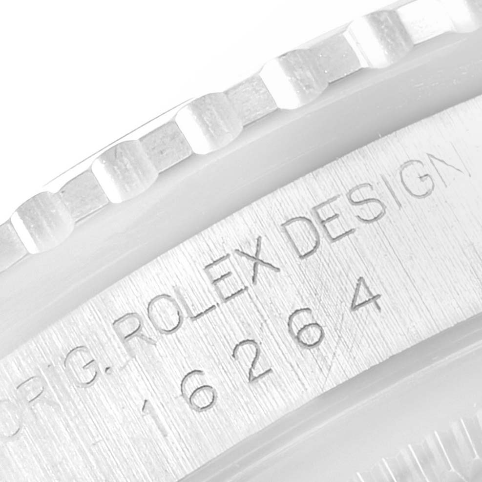 This image shows a close-up of the case side and bezel of the Rolex Turn-o-Graph 16264 Men's Stainless Steel Black Dial 16264 Men's Stainless Steel Black Dial model, including its engraved serial number.