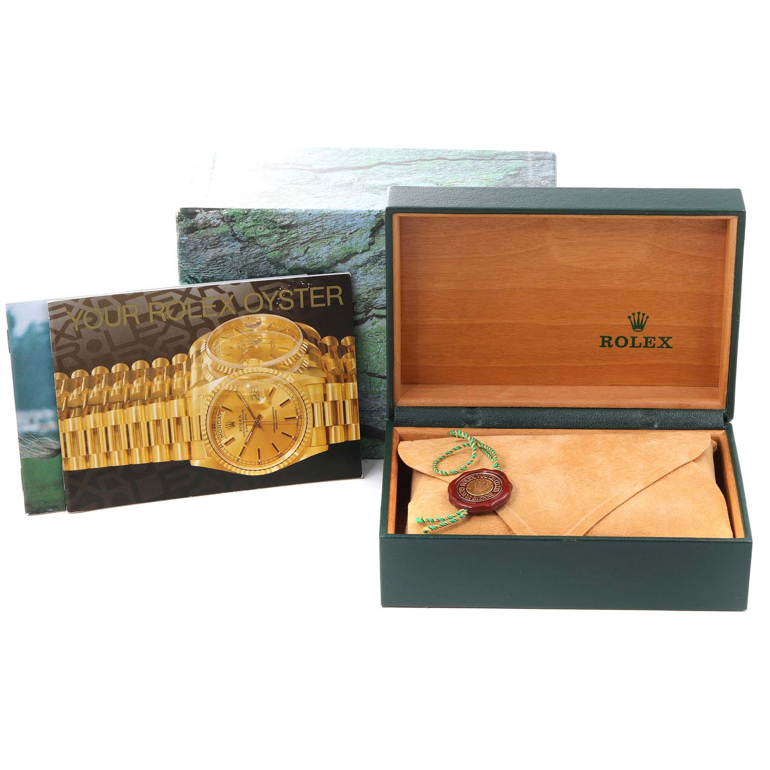 The image shows packaging accessories for a Rolex Turn-o-Graph 16264 Men's Stainless Steel White Dial 16264 Men's Stainless Steel White Dial, including the box, pouch, and booklet.