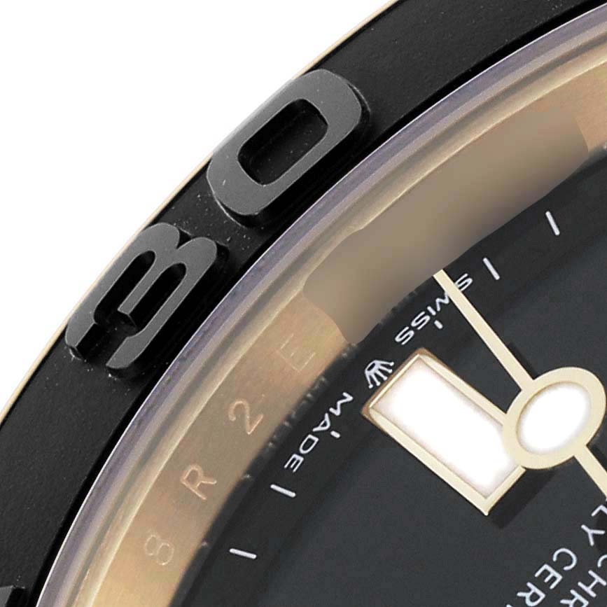 The image shows a close-up of the bezel and part of the dial of a Rolex Yacht-Master 226658 Men's Yellow Gold Black Dial 226658 Men's Yellow Gold Black Dial watch.