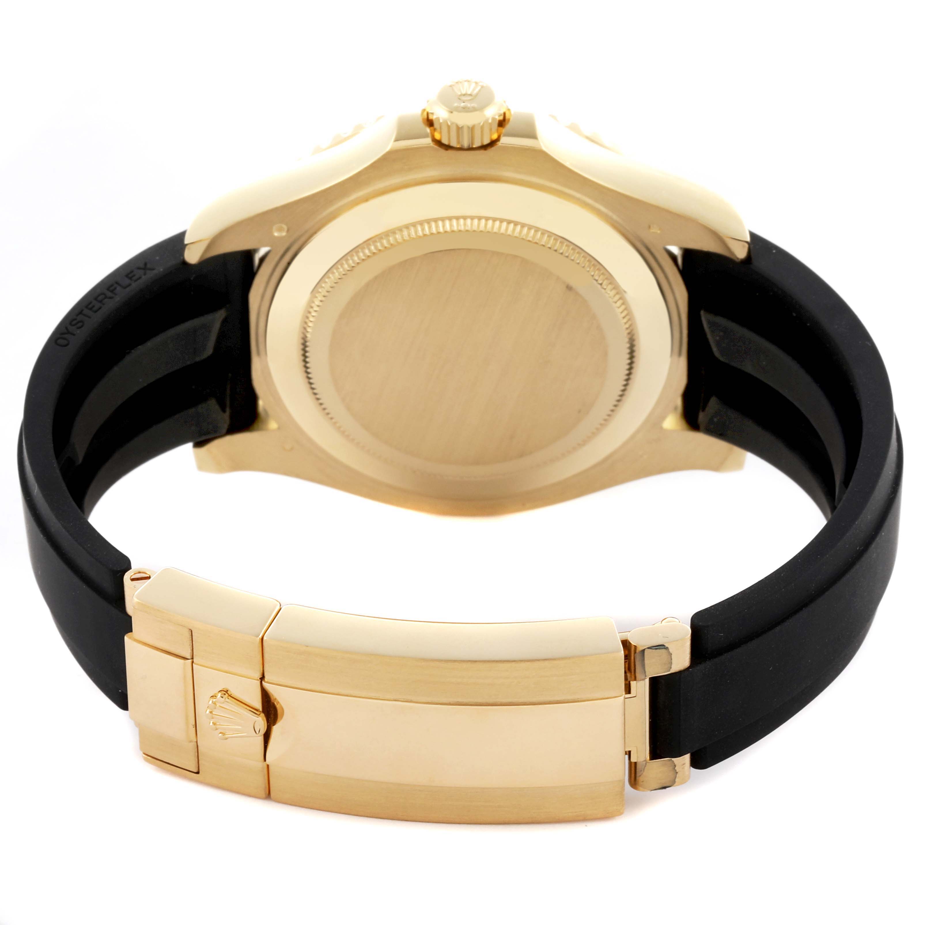 The image shows the back and clasp of a Rolex Yacht-Master 226658 Men's Yellow Gold Black Dial 226658 Men's Yellow Gold Black Dial, highlighting its gold case and black rubber strap.
